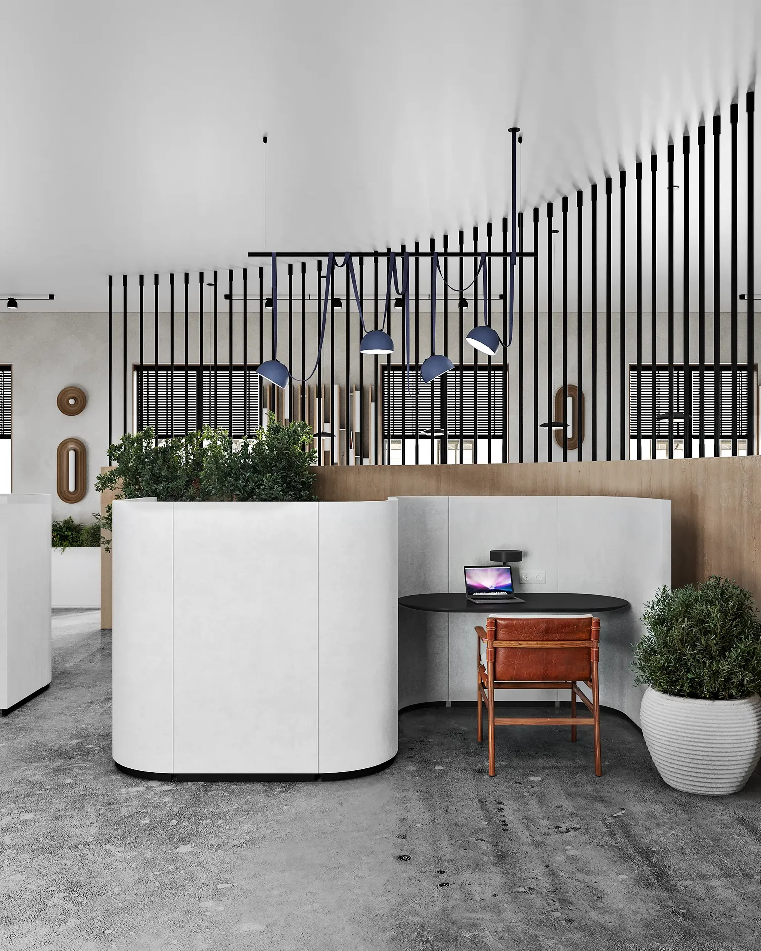 Casual work lounge featuring a long sofa against a wooden partition, with coffee tables.