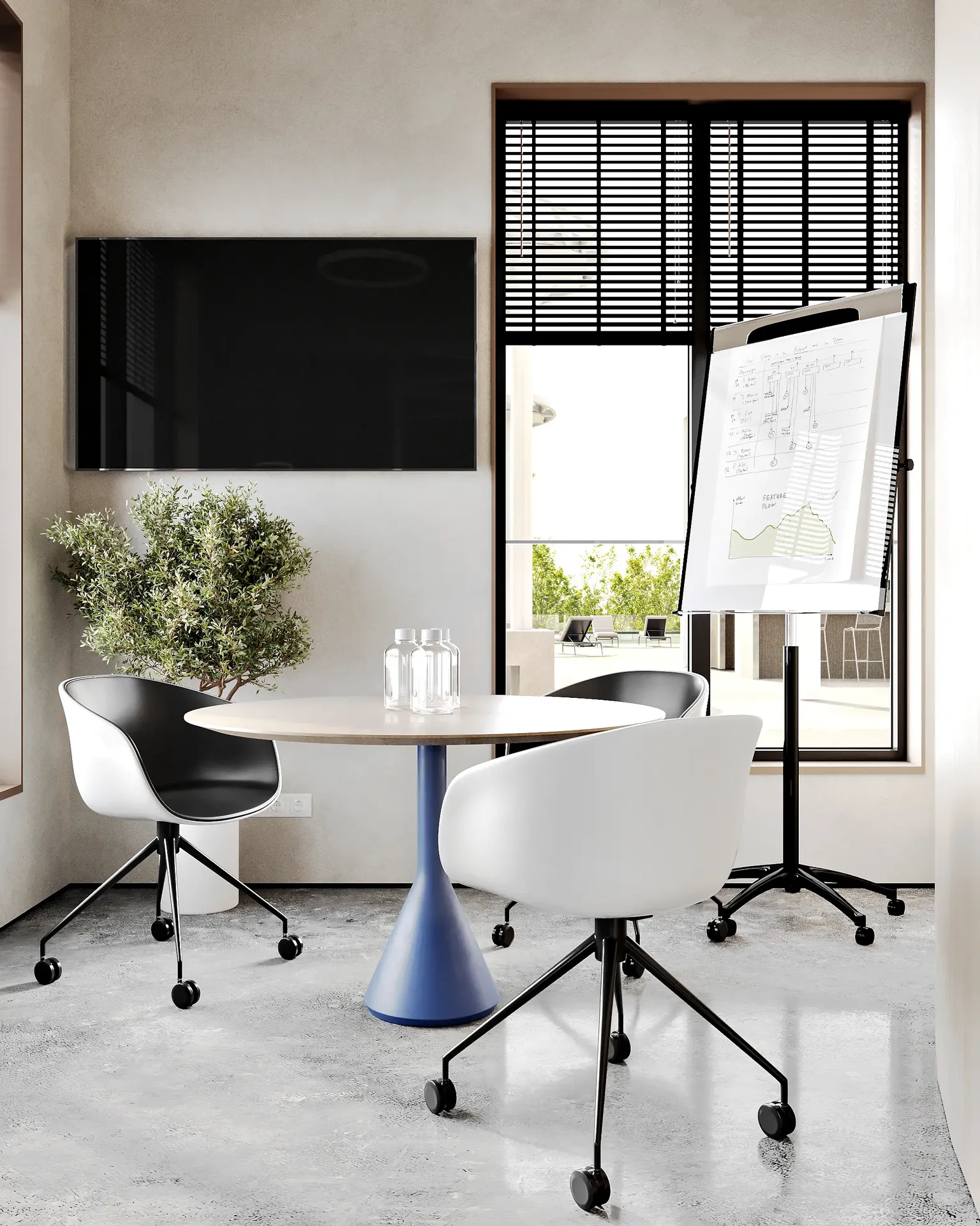 Intimate four-person meeting room, ideal for small team collaborations.