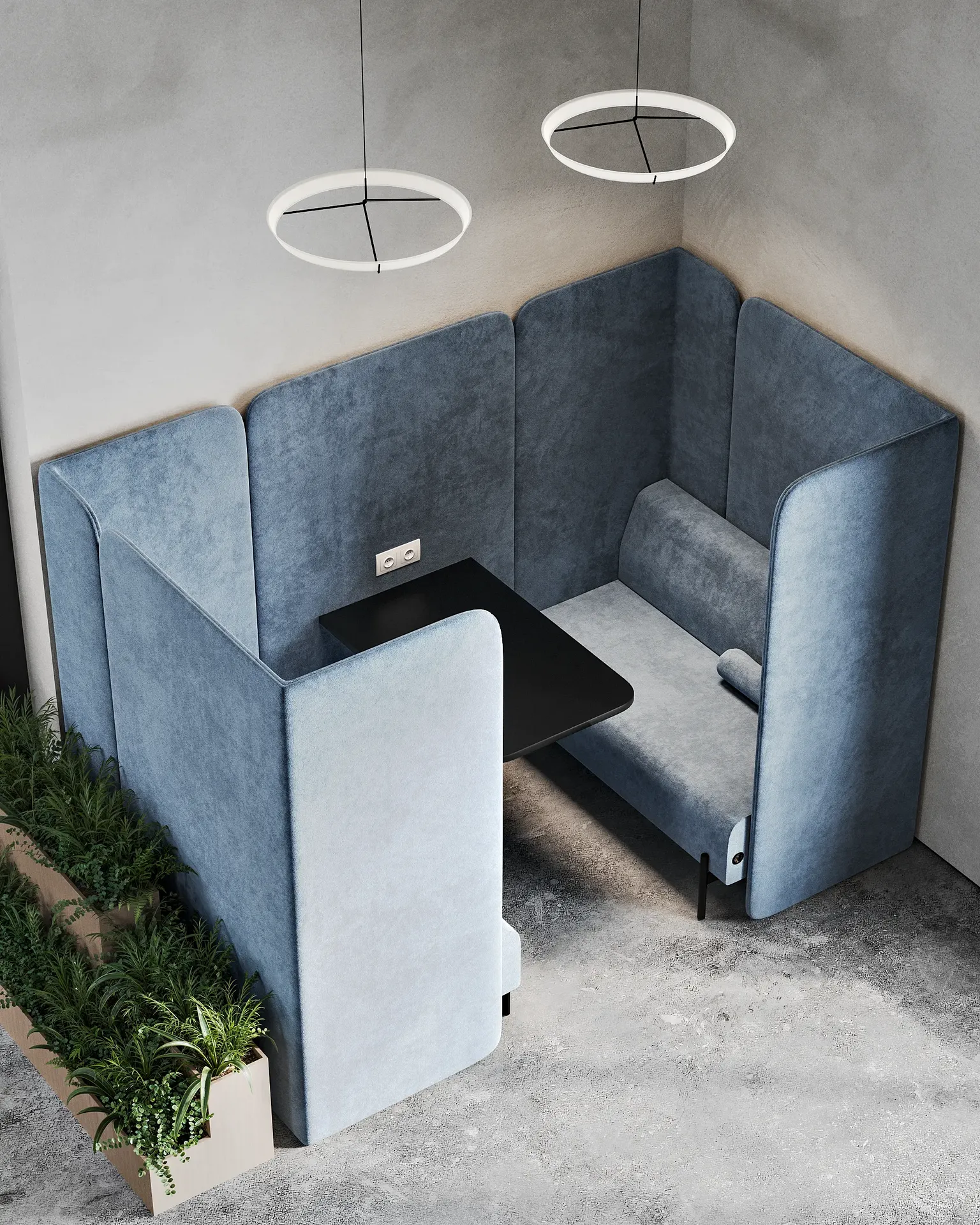 Top-down view of a compact, blue upholstered meeting booth for two people.