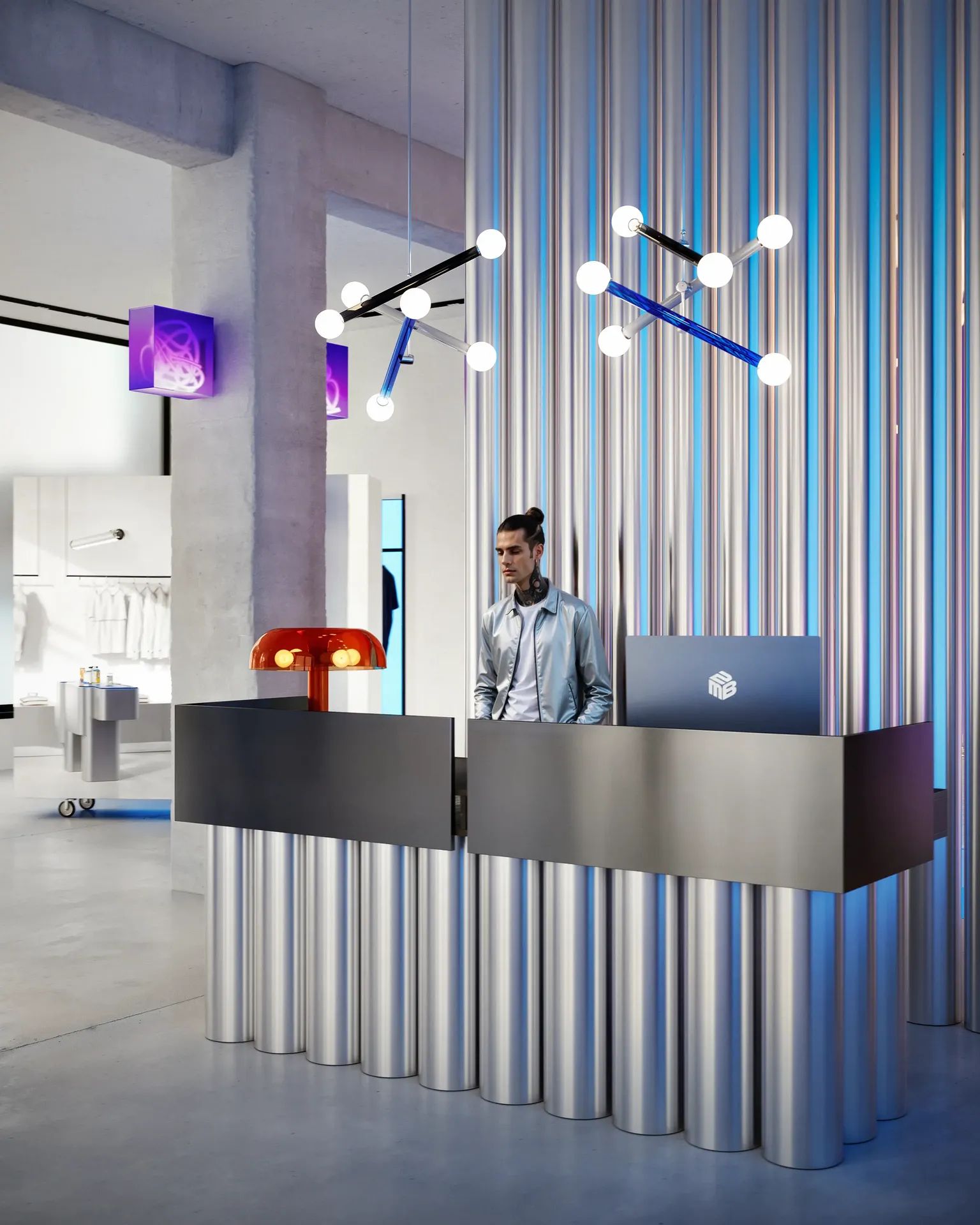 Modern reception desk with a staff member, leading into a retail sales area.
