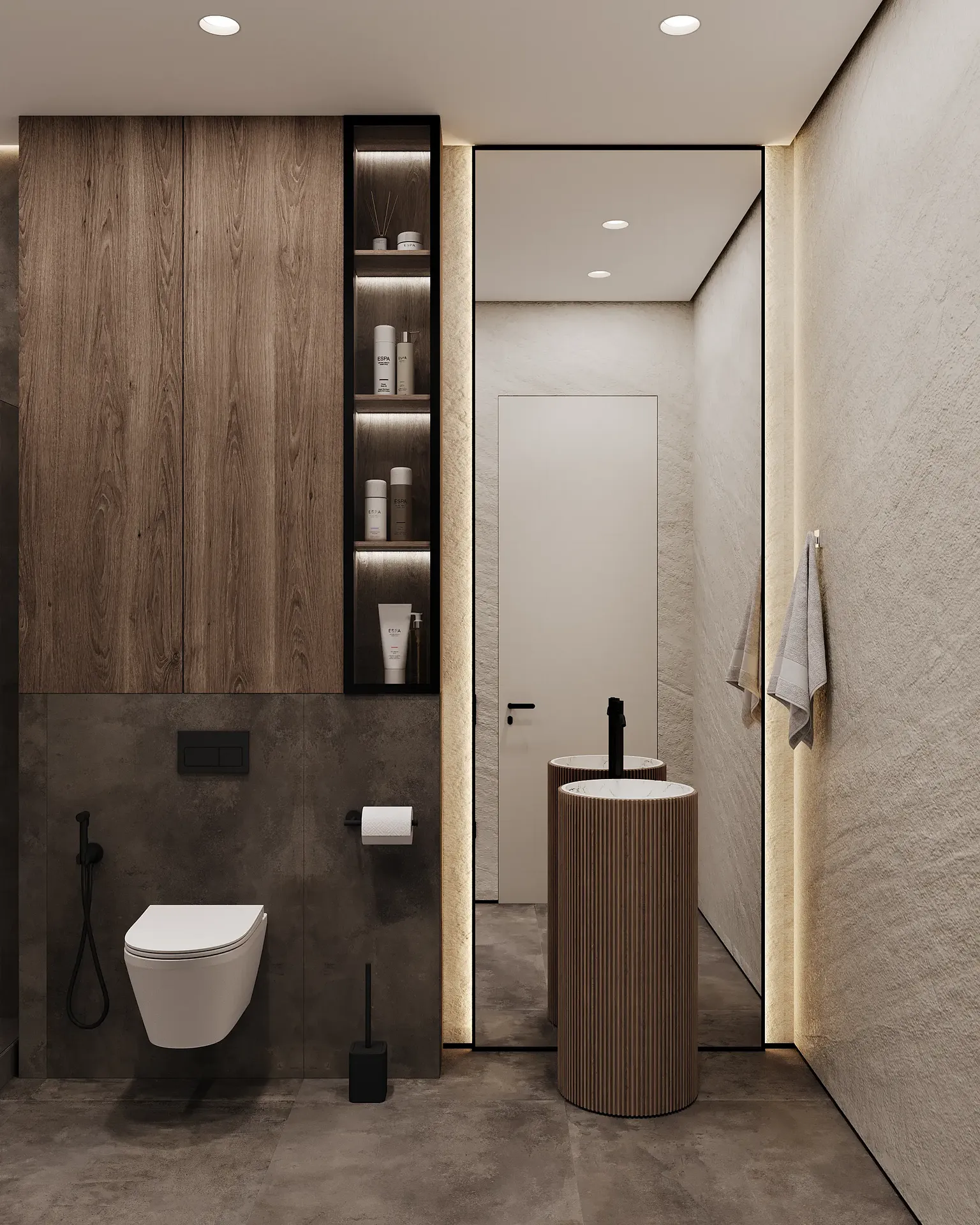 Minimalist guest bathroom with a wall-mounted toilet, round mirror, and a sleek vessel sink.