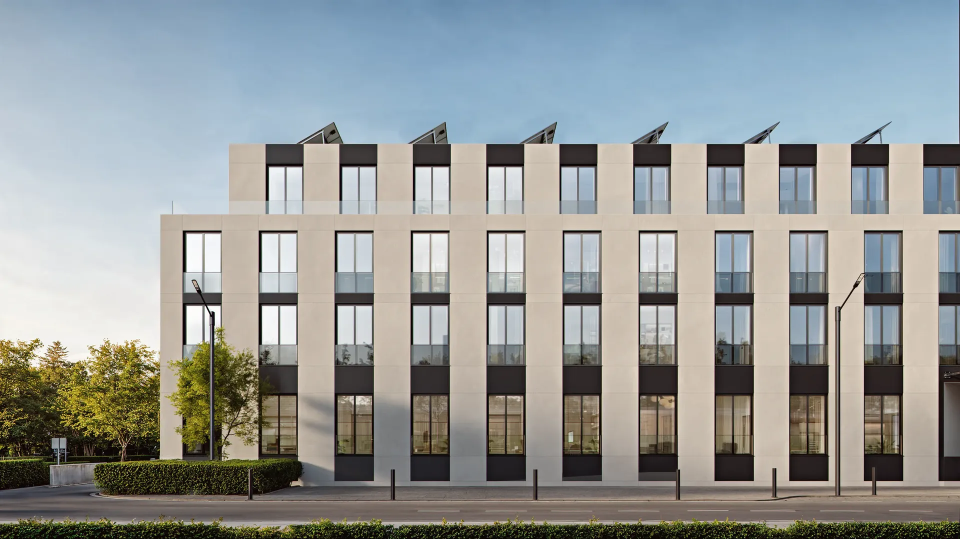 Frontal daytime view of the modern residential complex, showcasing facade design option 1.