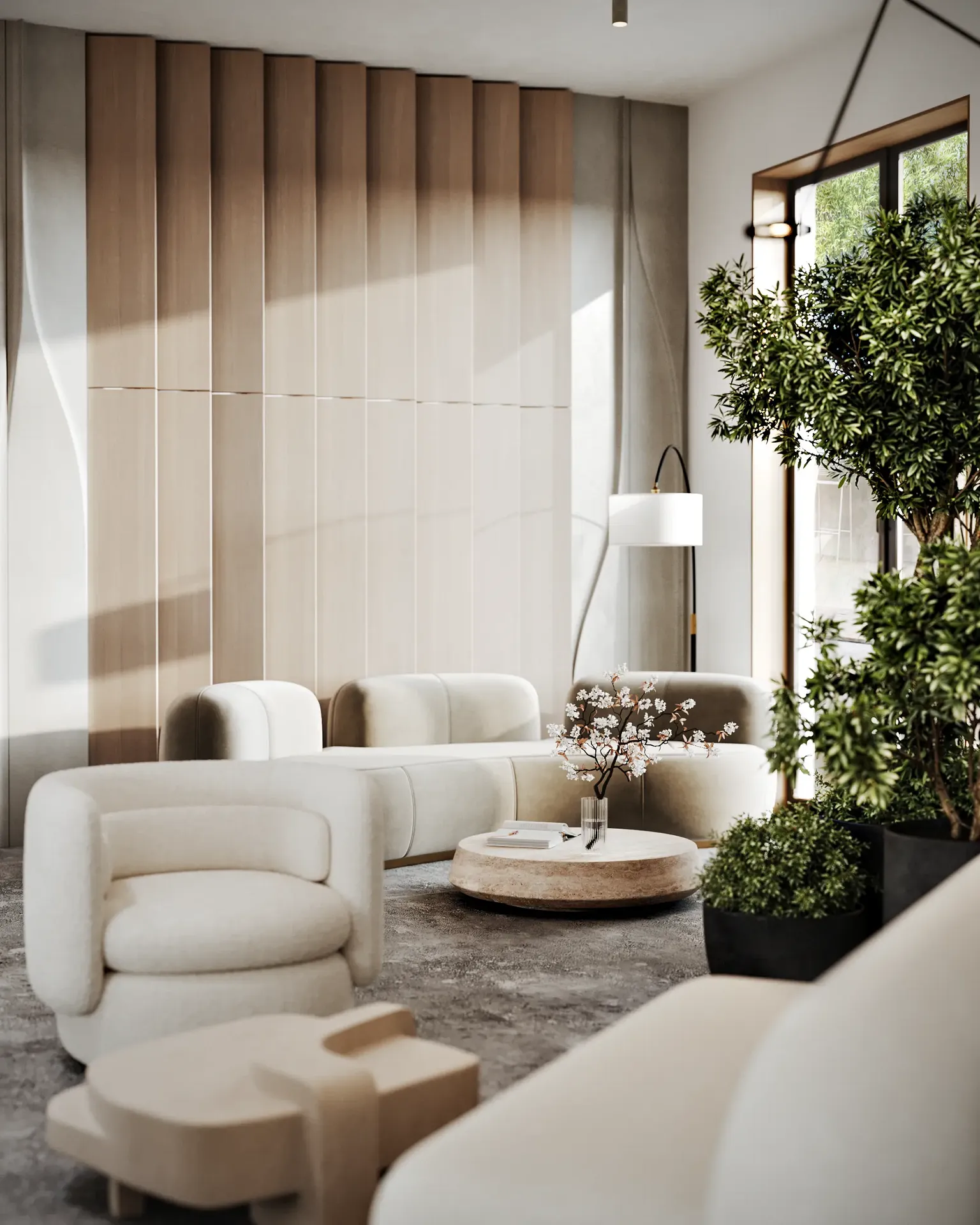 Sunlit entrance lounge by a window, with cozy sofas, armchairs, and large plant arrangements.