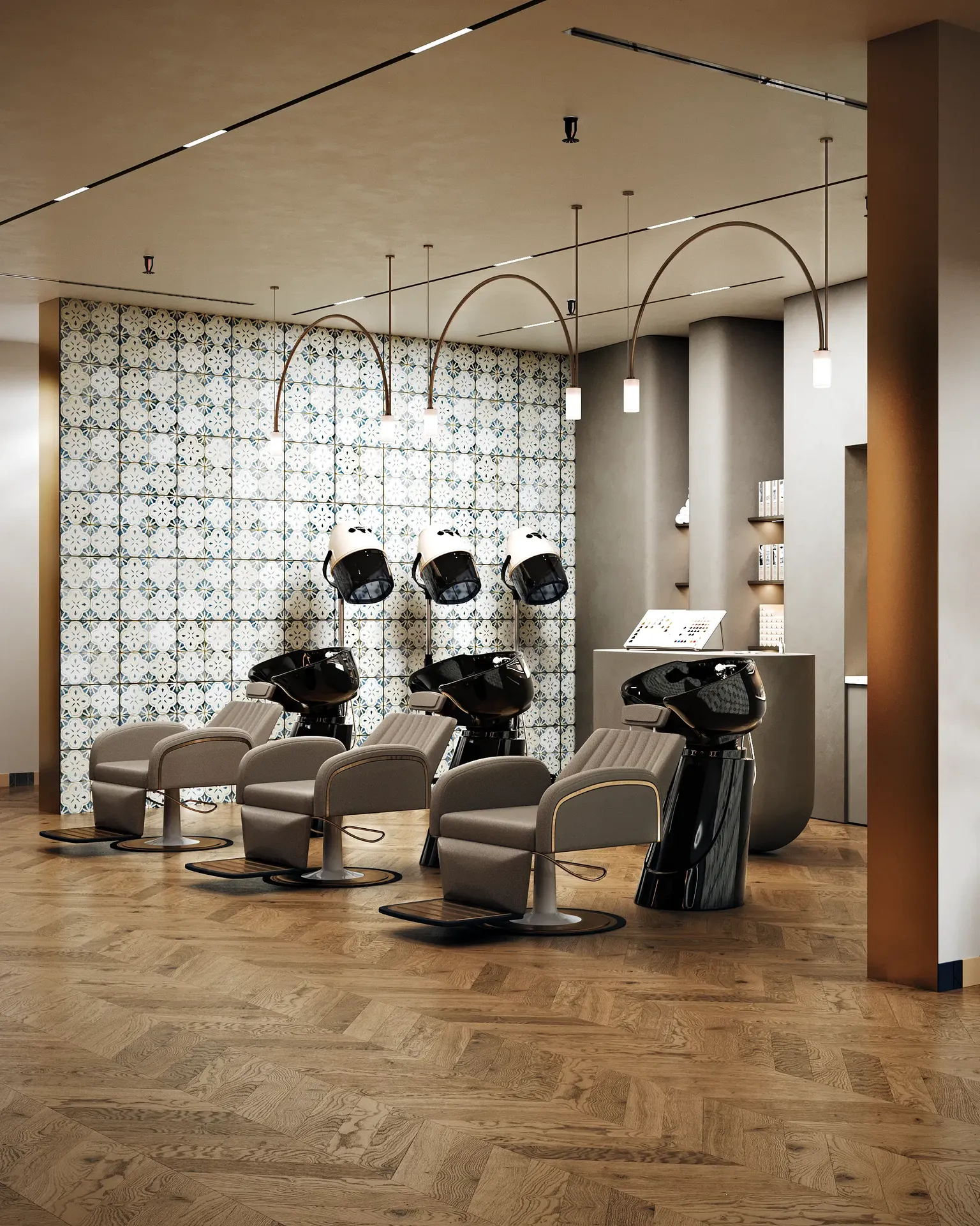 Wide view of the salon's hair washing area, featuring comfortable reclining chairs and basins.