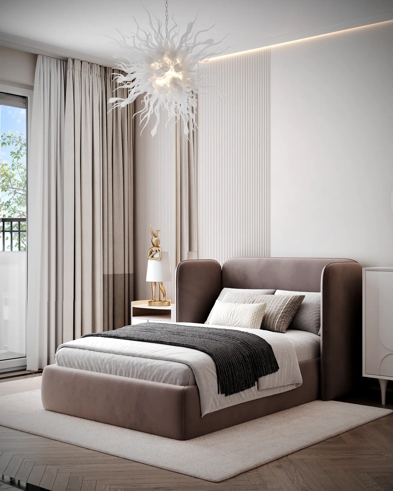 Close-up view of a modern bed with stylish neutral bedding in a teenager's room.