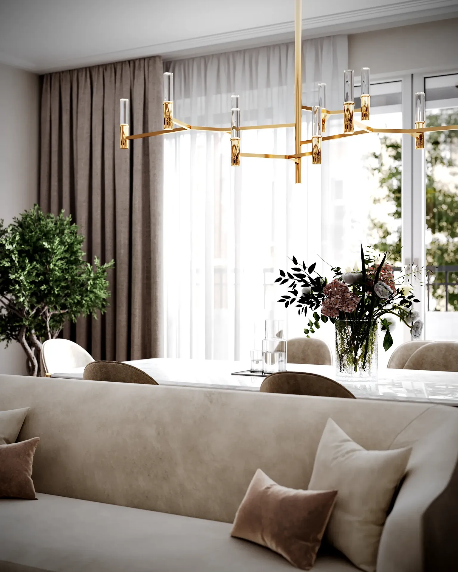 View from behind the sofa, focusing on the dining area's elegant decor and pendant lighting.