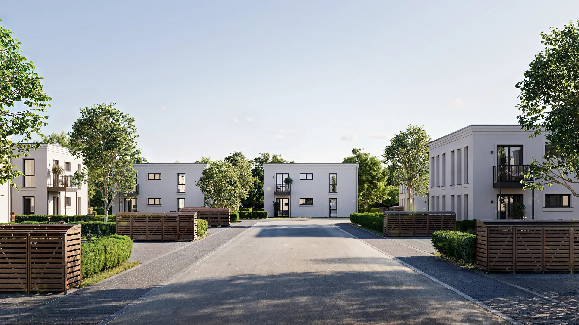 Street perspective showing modern townhouse facades in a residential complex.