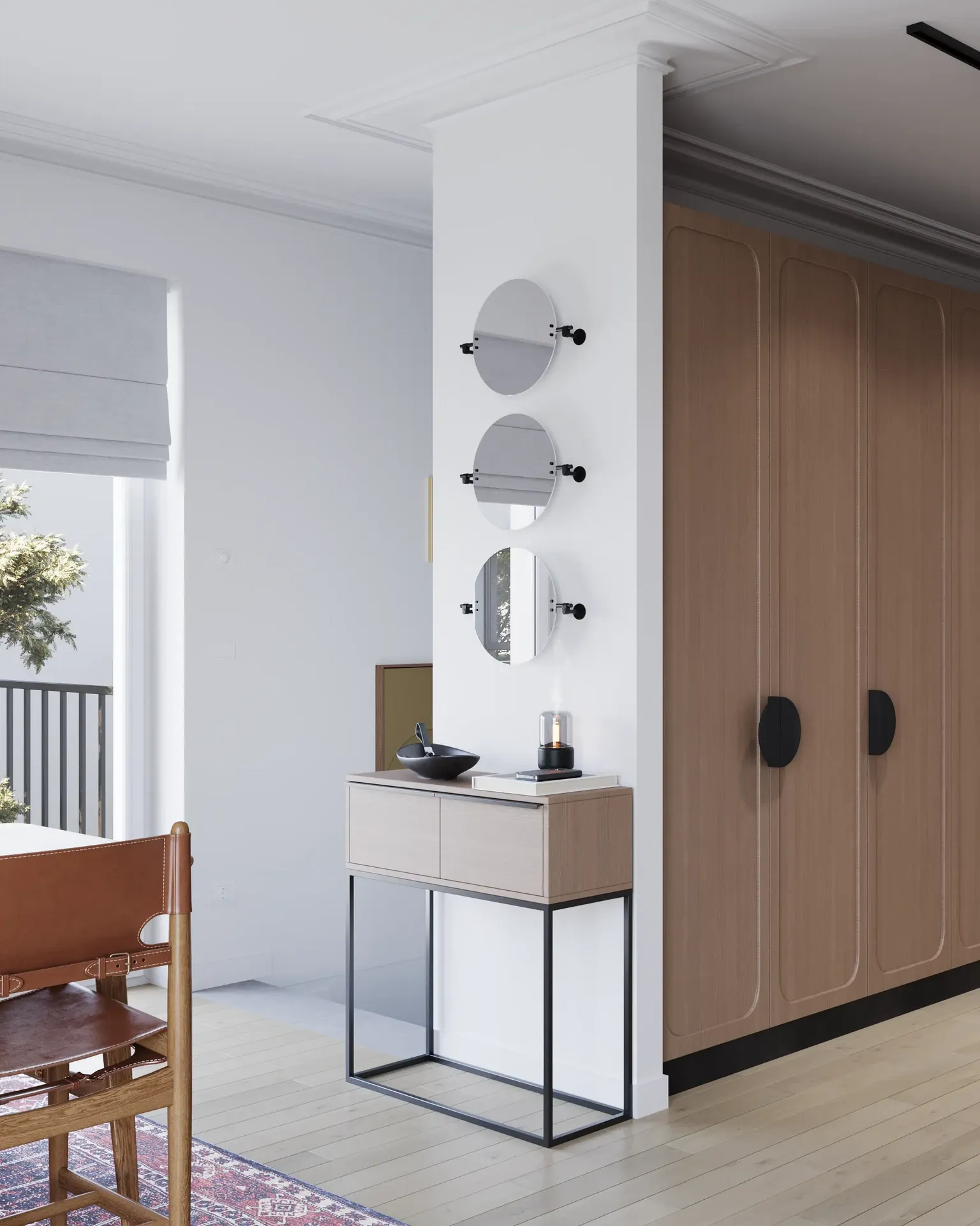 Angled view of the entrance, mirror console, and wardrobe.
