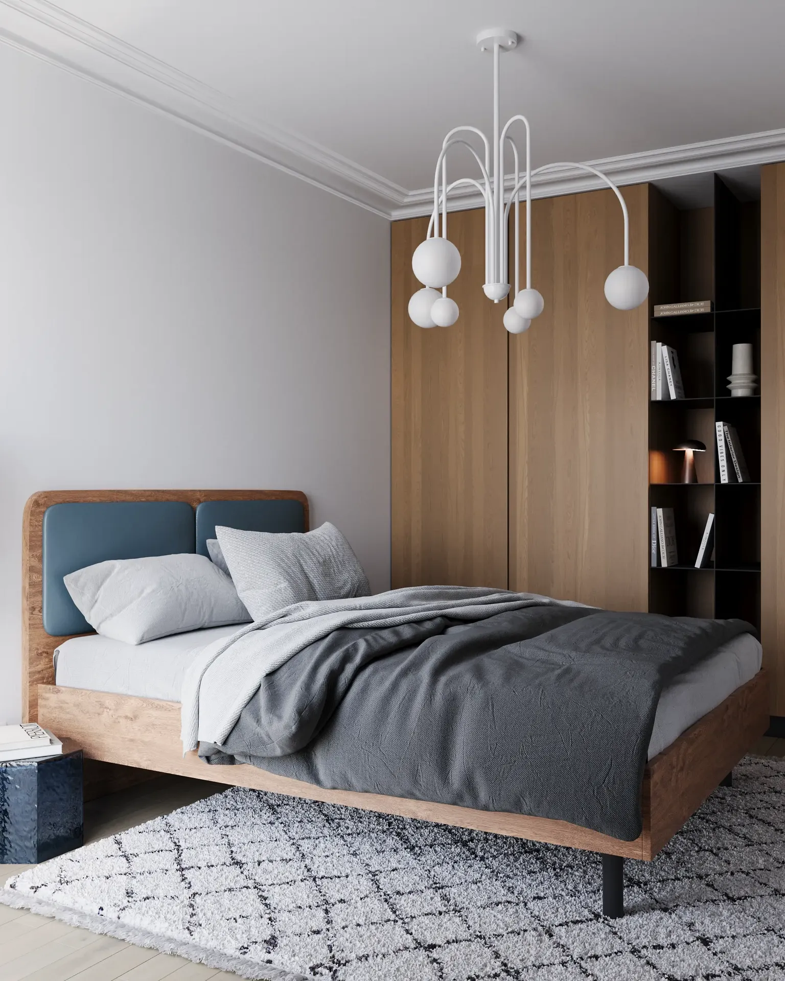 Angled view of a bed and wardrobe with open shelves.