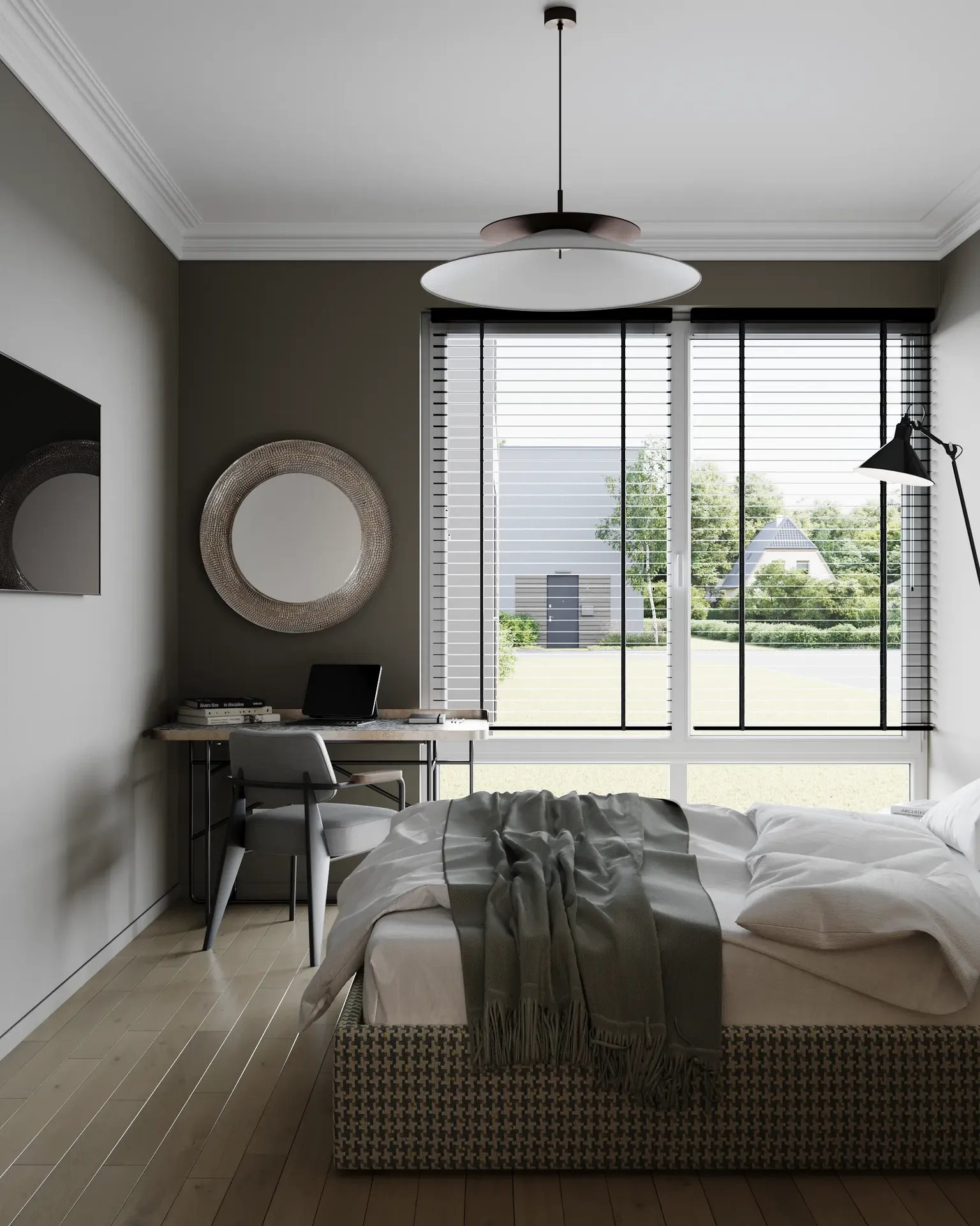 View of a bedroom window, workspace, and part of the bed.