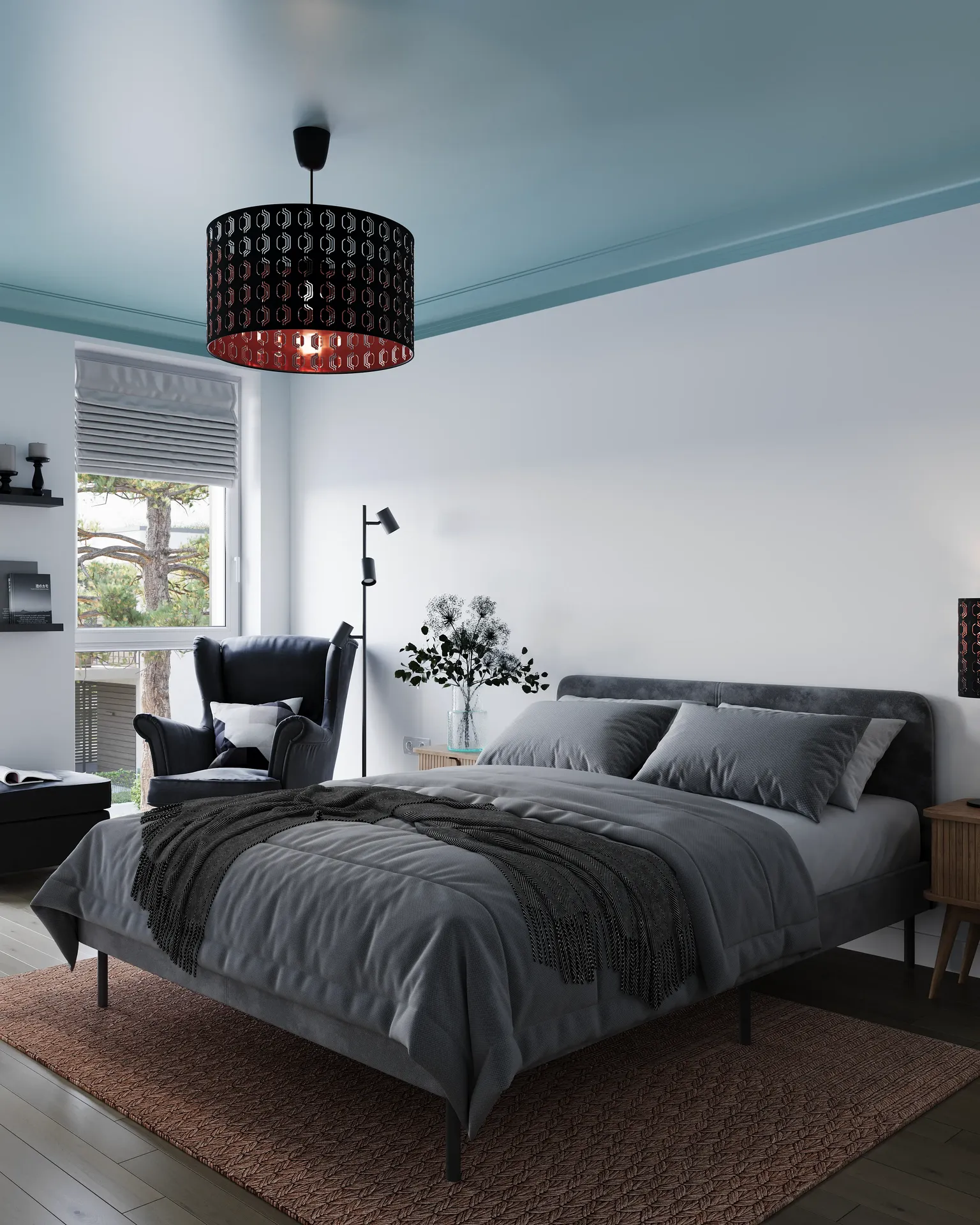 Angled view of a bed and armchair by the window.