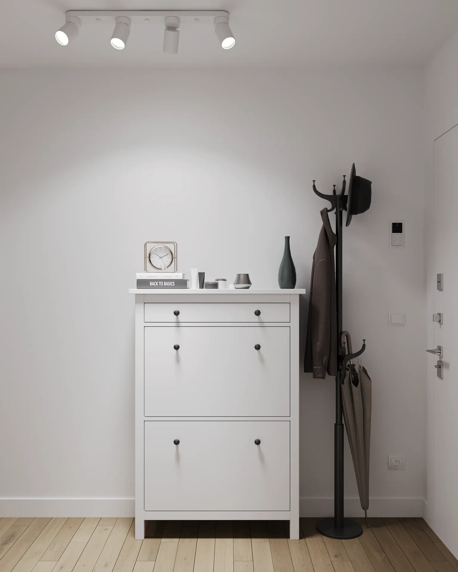 Front view of a chest of drawers and hanger.