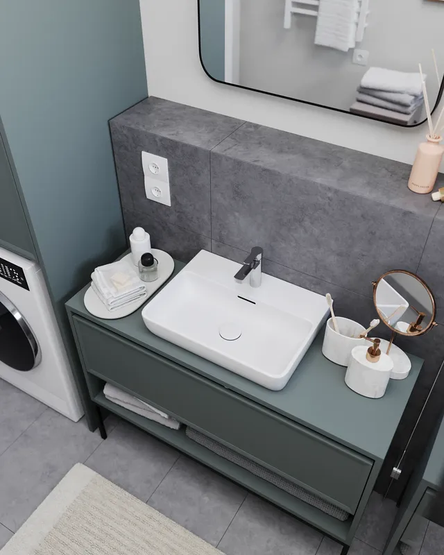 Top-down view of a sink and decorative items.