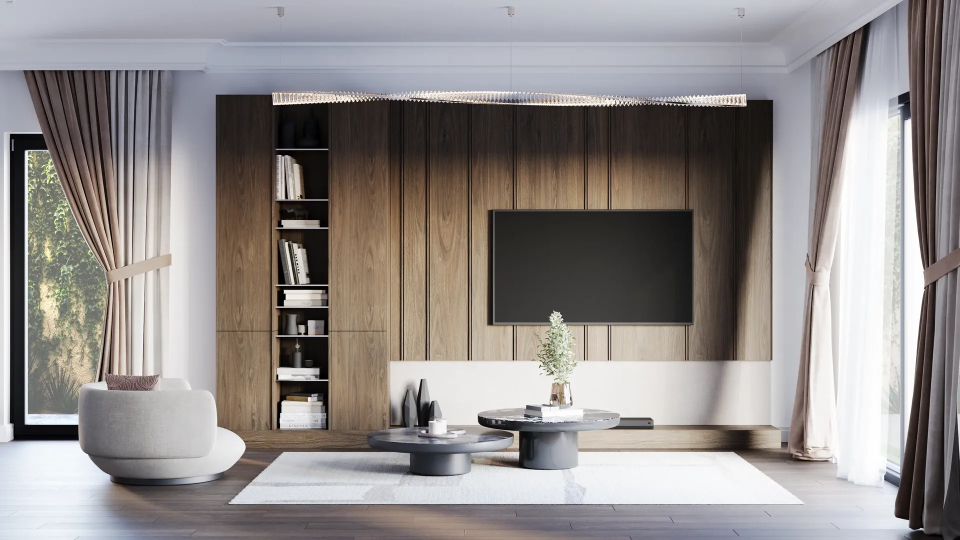 Front view of main living area with TV wall and armchairs