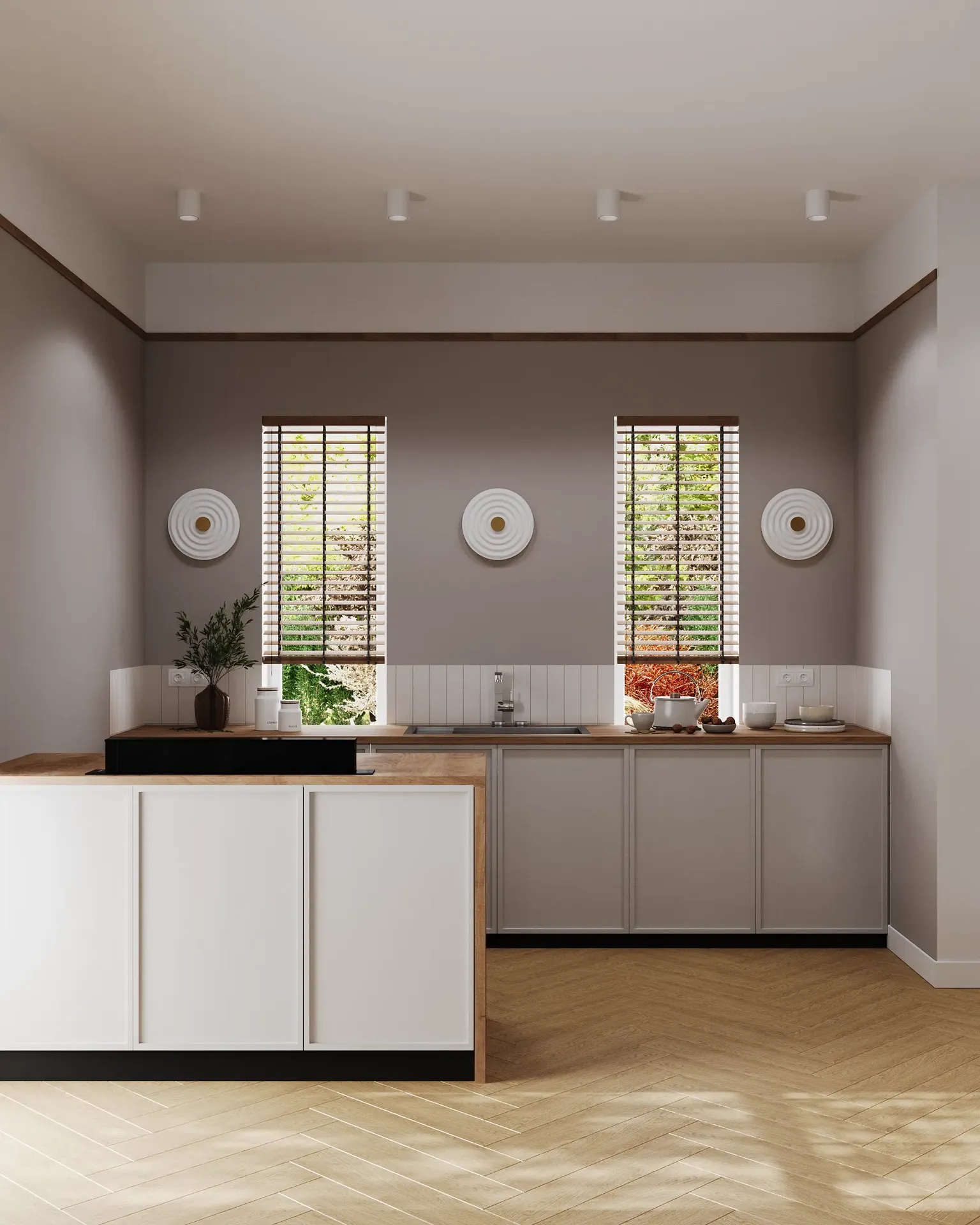 Front view of a kitchen with window, island, and built-in hood.