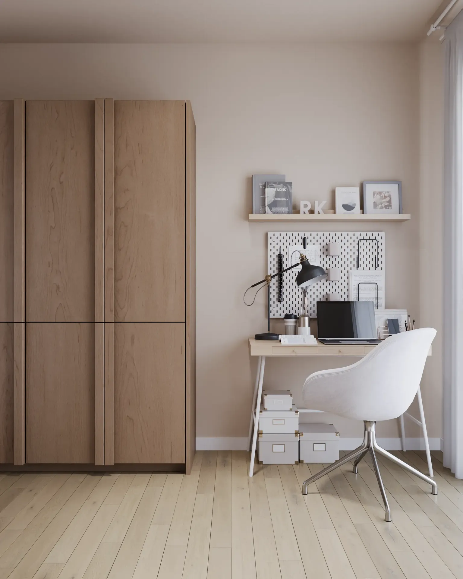 Front view of a wardrobe and workspace with a laptop.