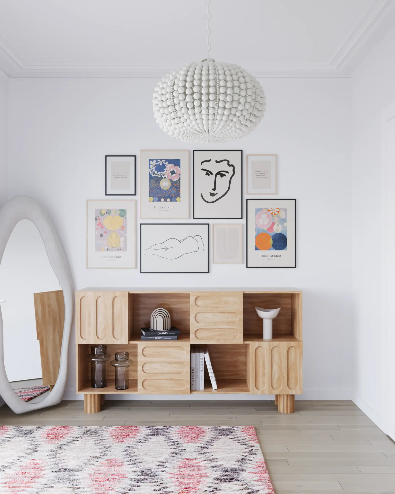 Front view of a storage chest of drawers and mirror.