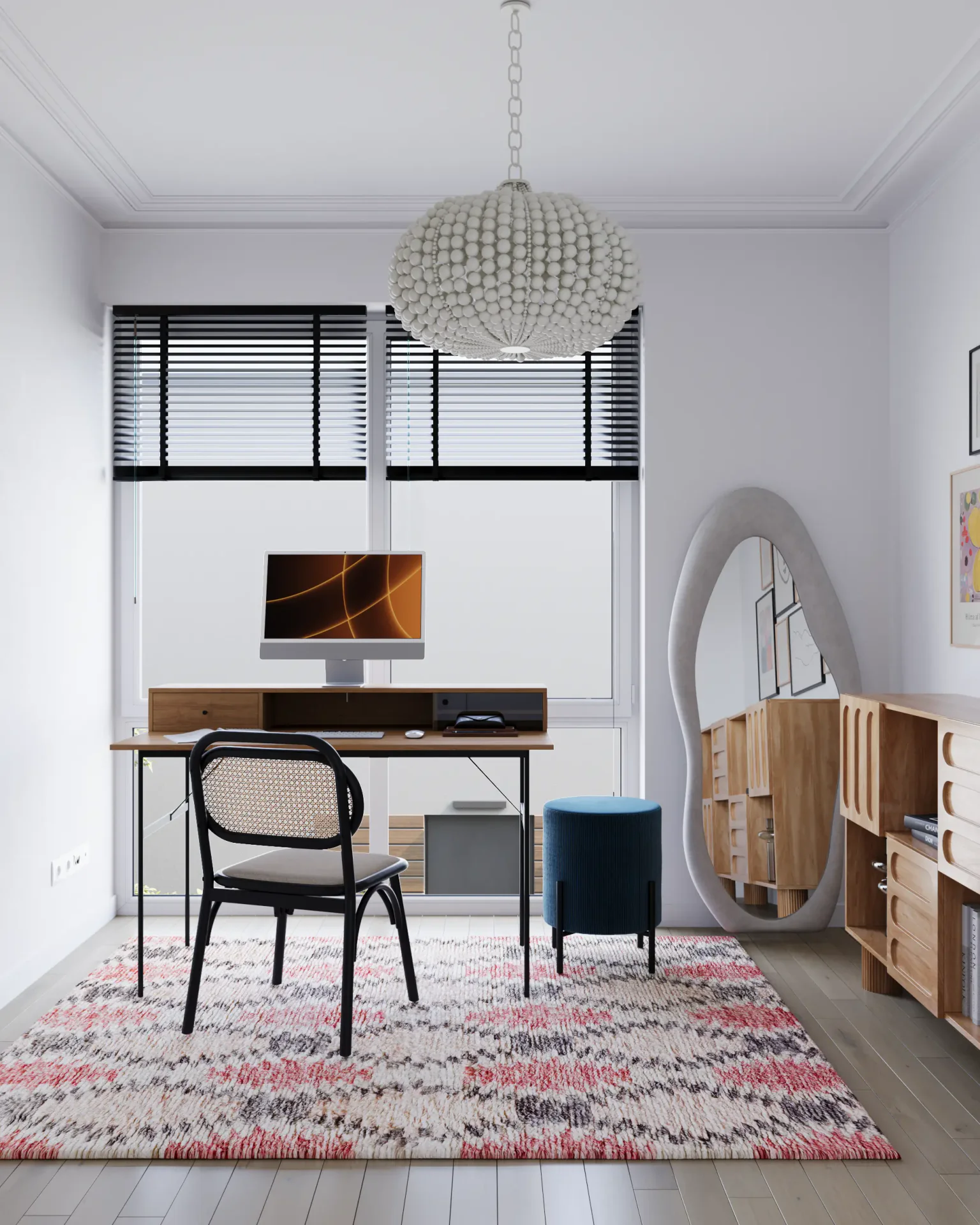 Workspace by the window with a desk, mirror, and chest of drawers.