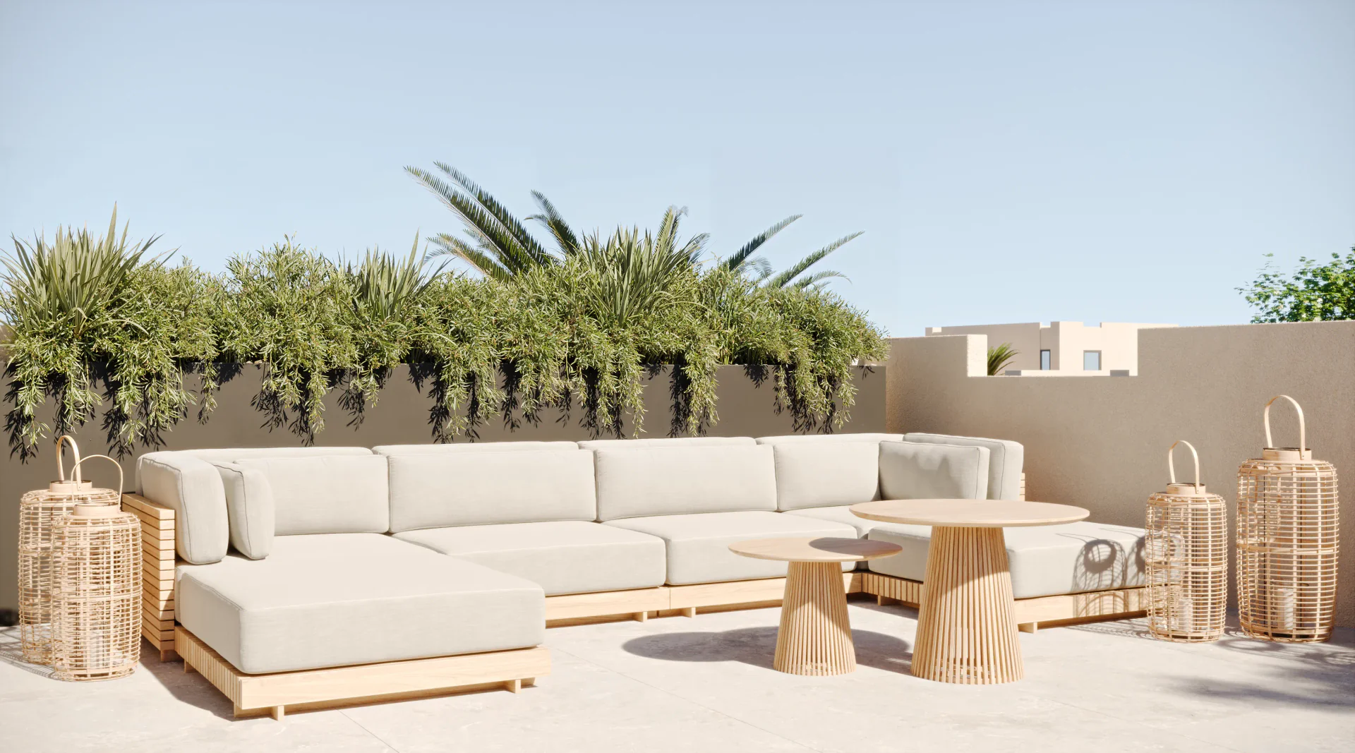 Rooftop terrace lounge area with outdoor sofas and tables