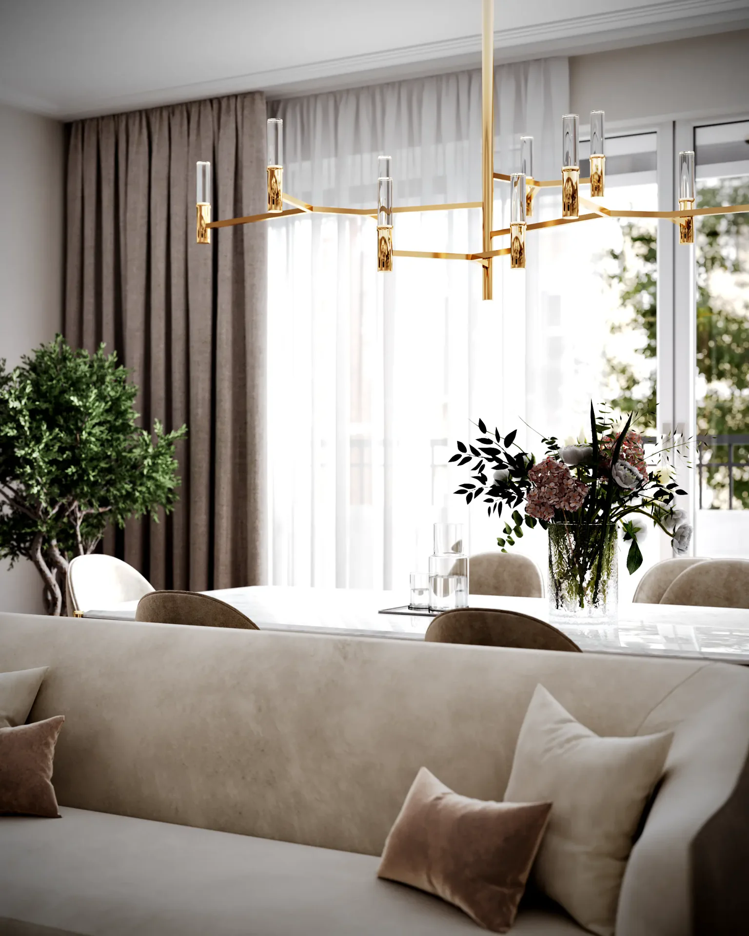 View from behind the sofa, focusing on the dining area's elegant decor and pendant lighting.