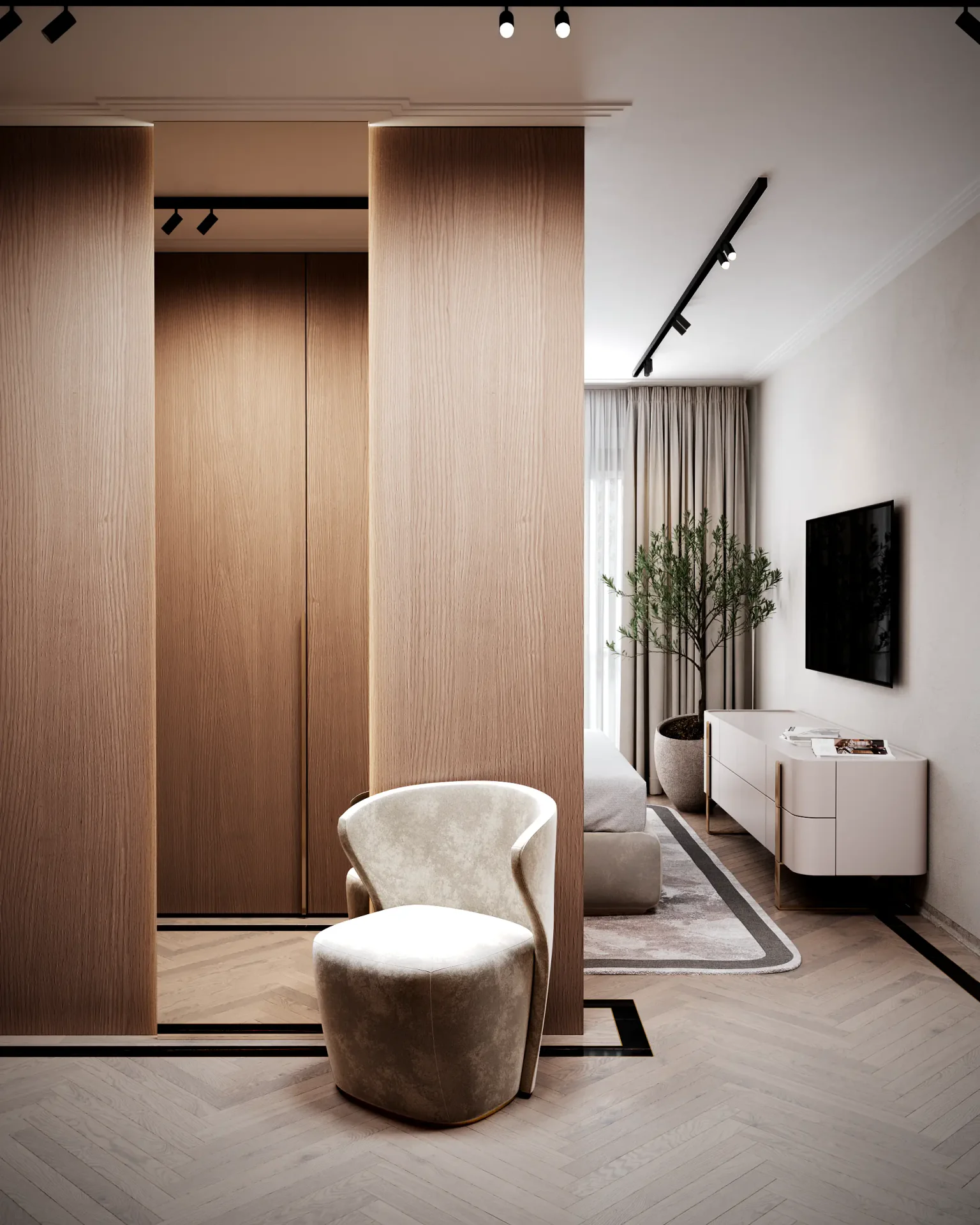 Frontal view of the master bedroom's chic dressing area with a mirror, armchair, and closet.