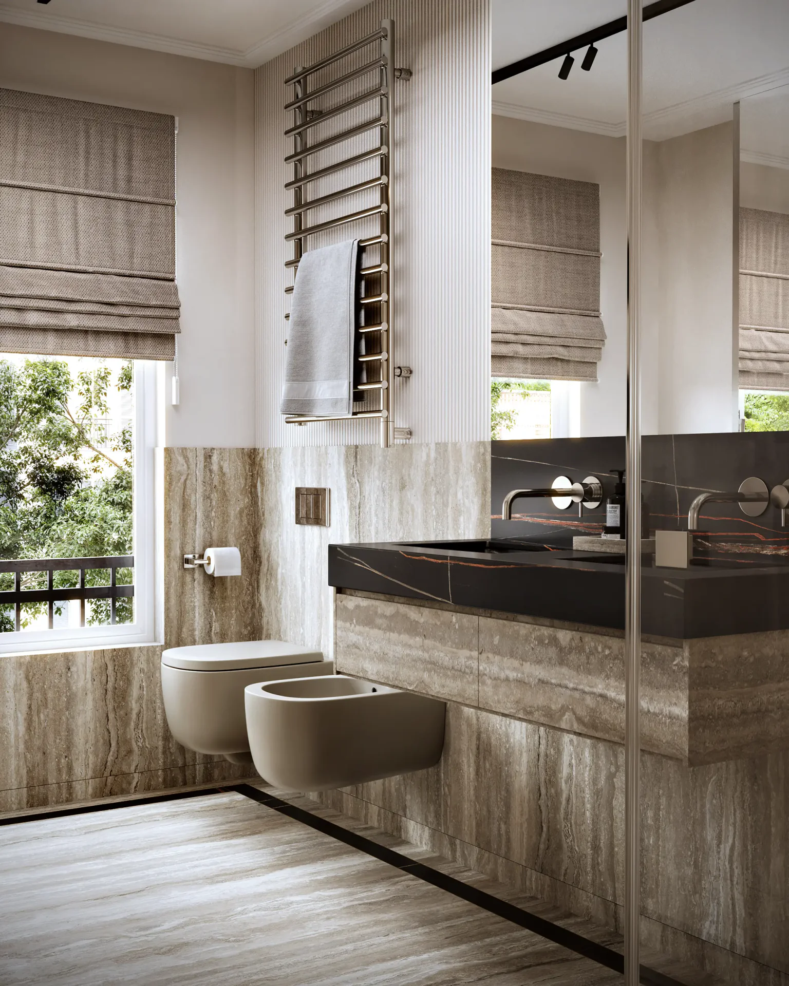 Corner view of the guest bathroom, showing the wall-mounted toilet, bidet, and vanity.