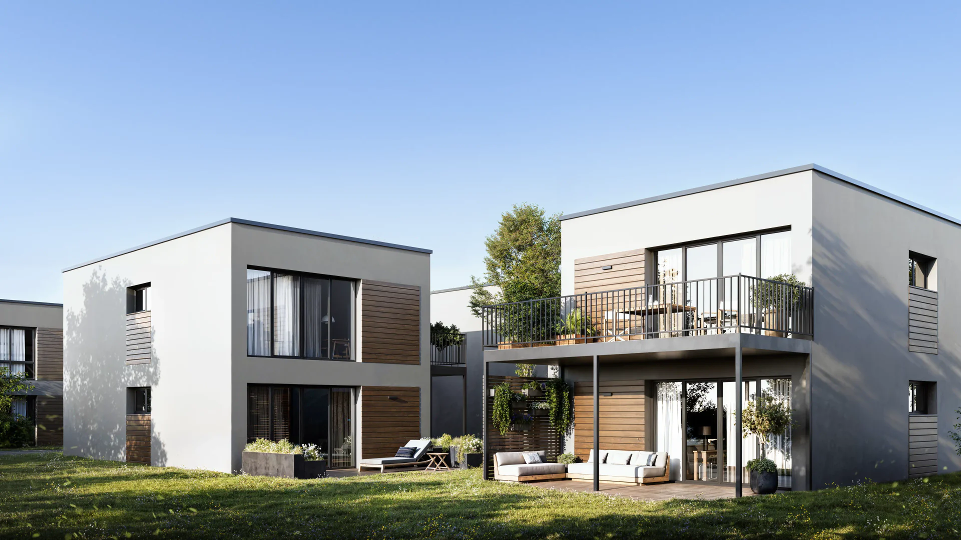 Close-up architectural detail of two-story homes with outdoor terraces.