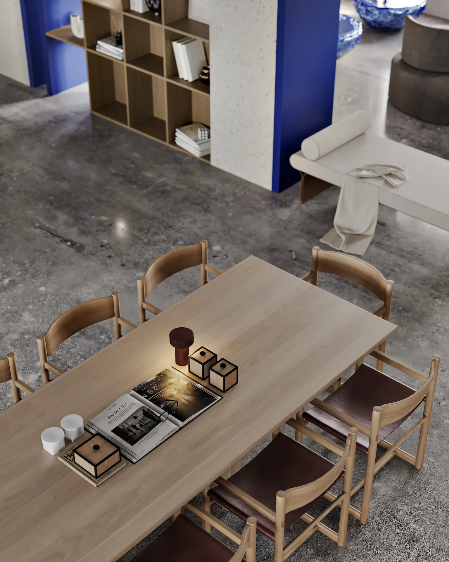 Large multi-purpose table in a library common area for meetings, work, or games.