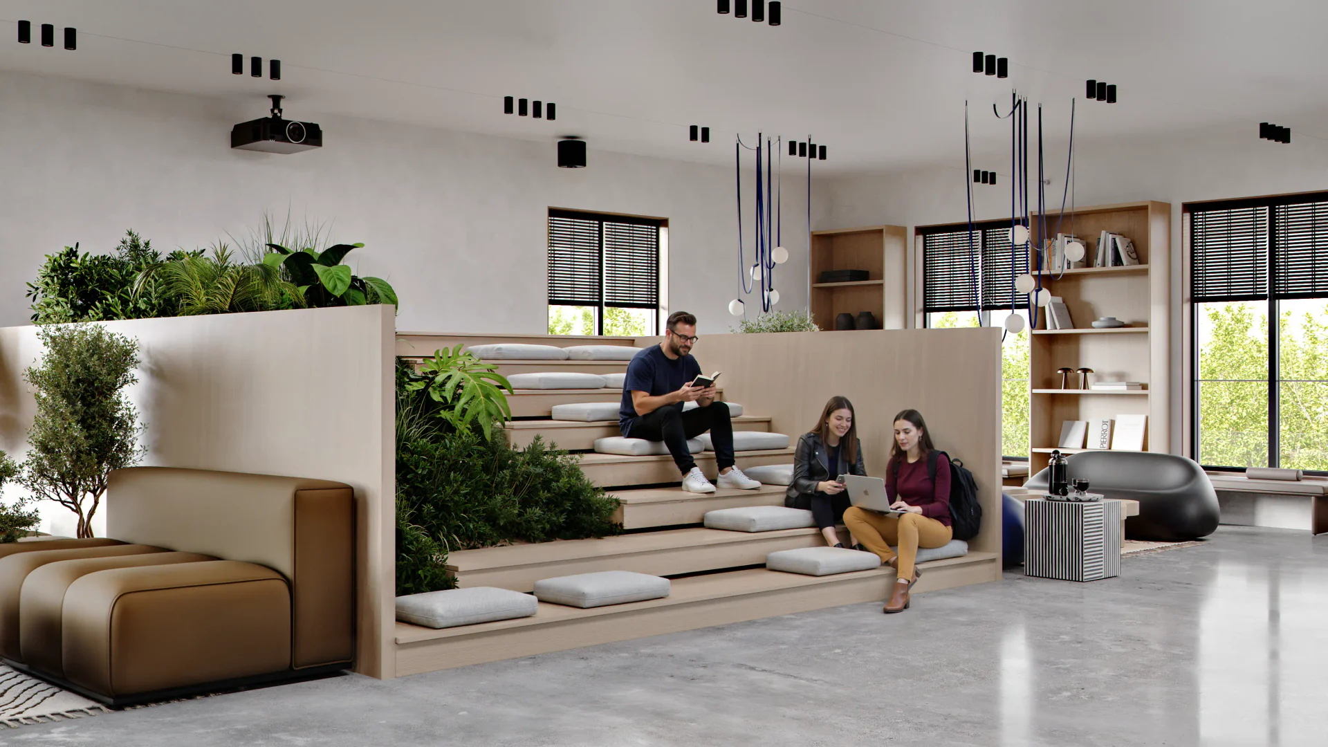 Students relaxing and watching a movie in a modern, communal screening room.