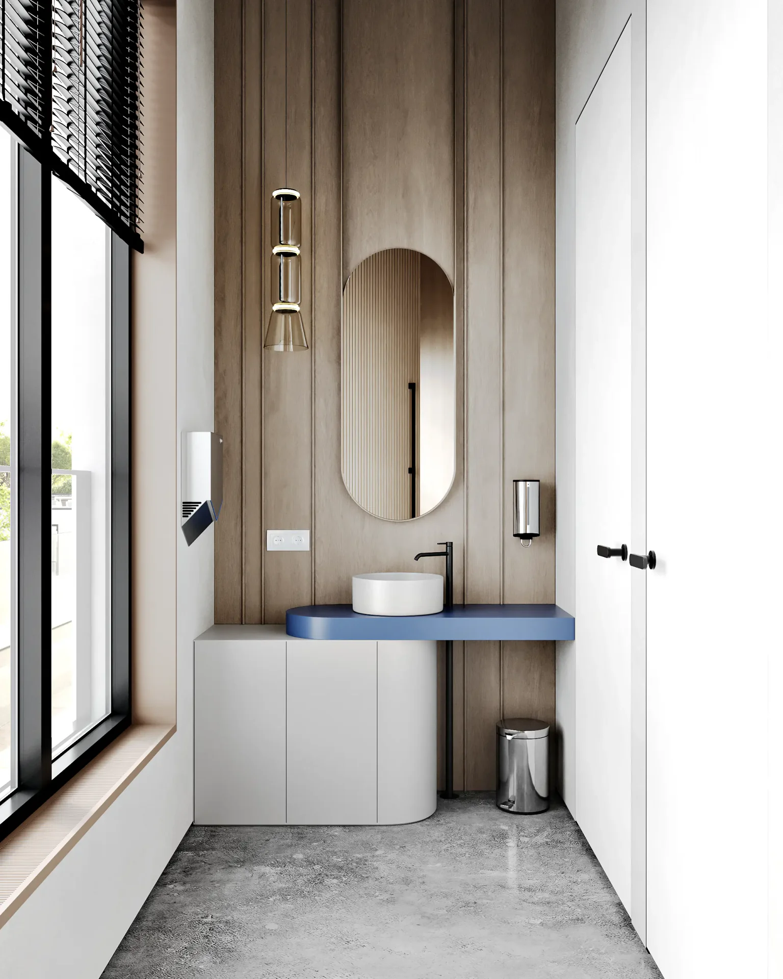 Modern restroom interior focusing on the clean vanity area with sink and large mirror.