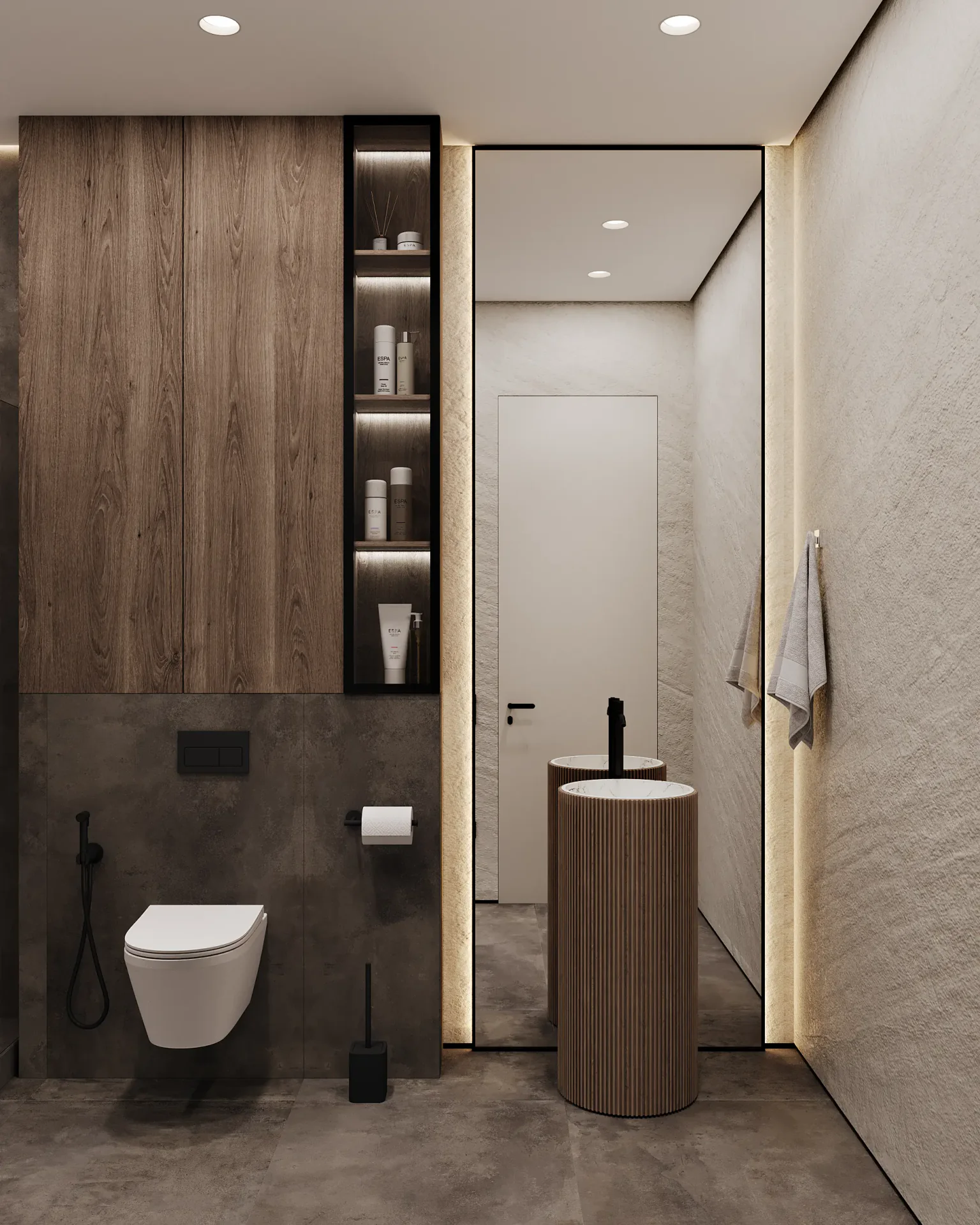 Minimalist guest bathroom with a wall-mounted toilet, round mirror, and a sleek vessel sink.