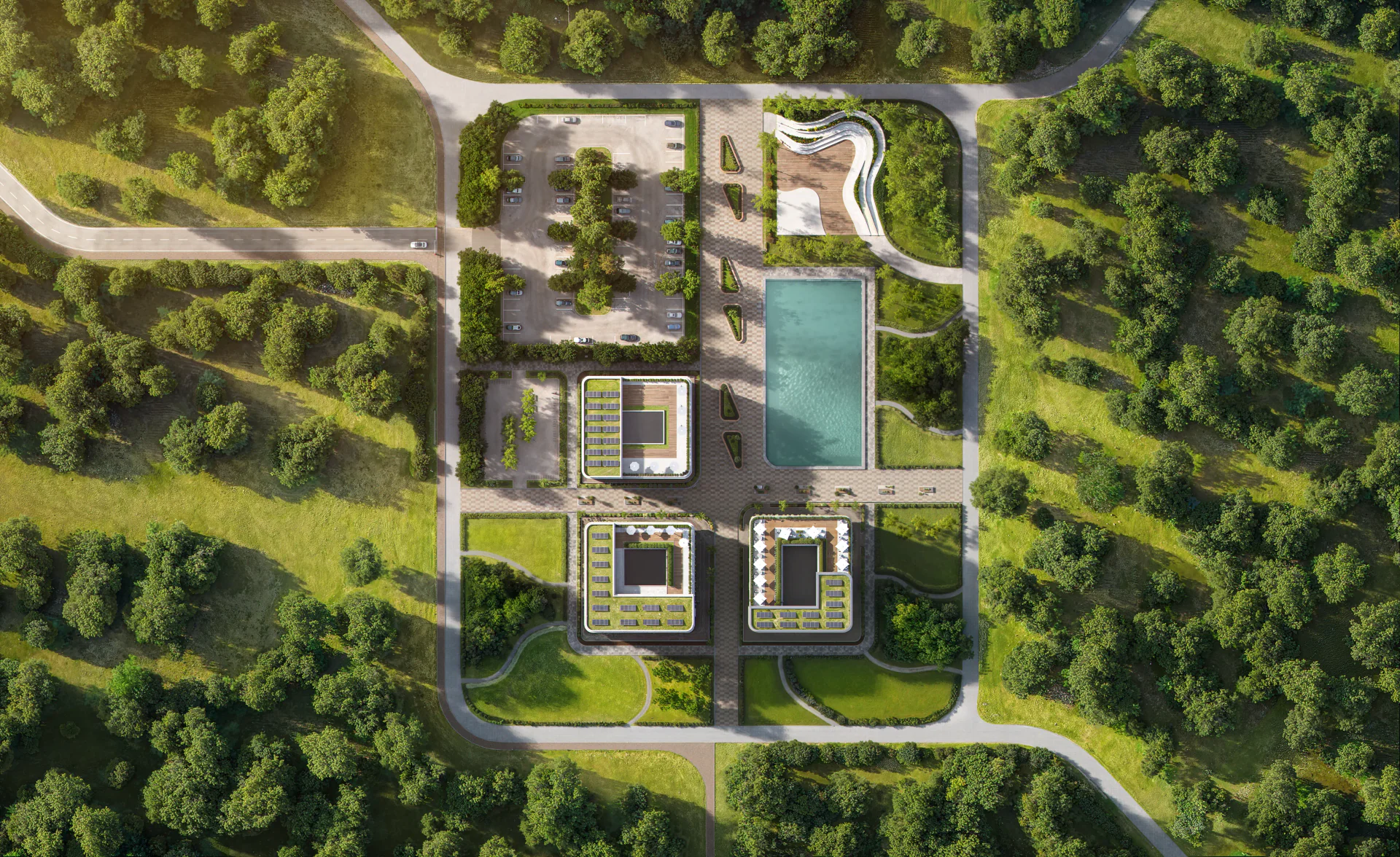 Aerial view of a modern residential complex layout and surrounding landscape.