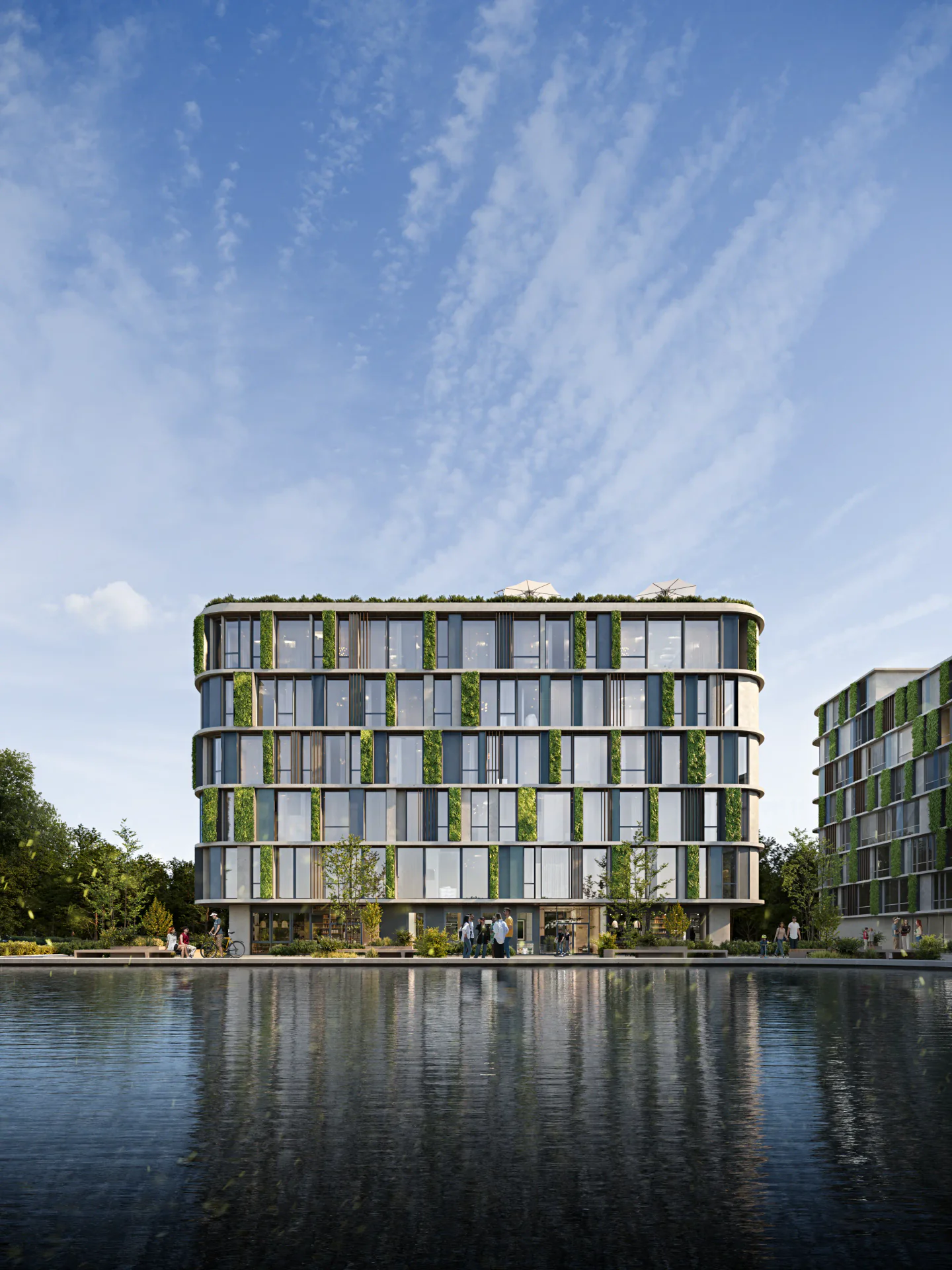 Frontal view of a modern resort building from the pool, with groups of people walking near the water.