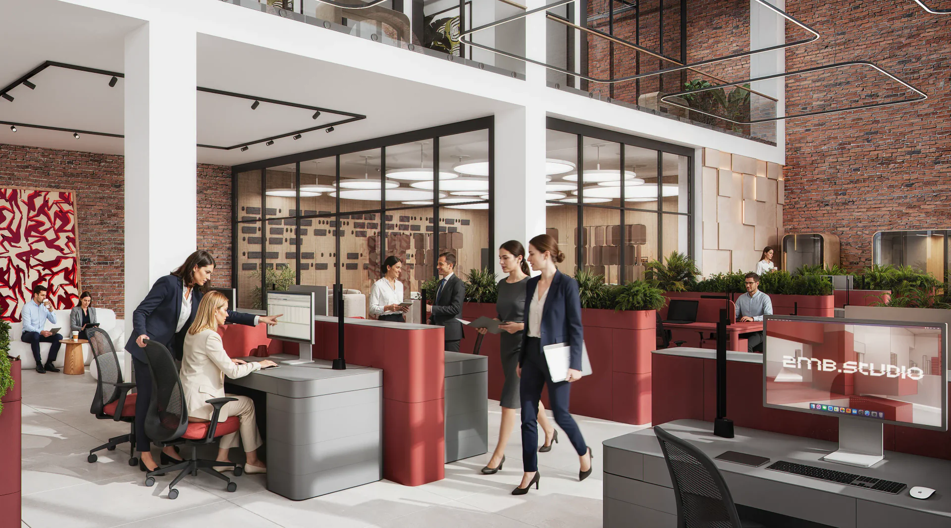 Busy open-plan office with employees working at partitioned desks near the break area.