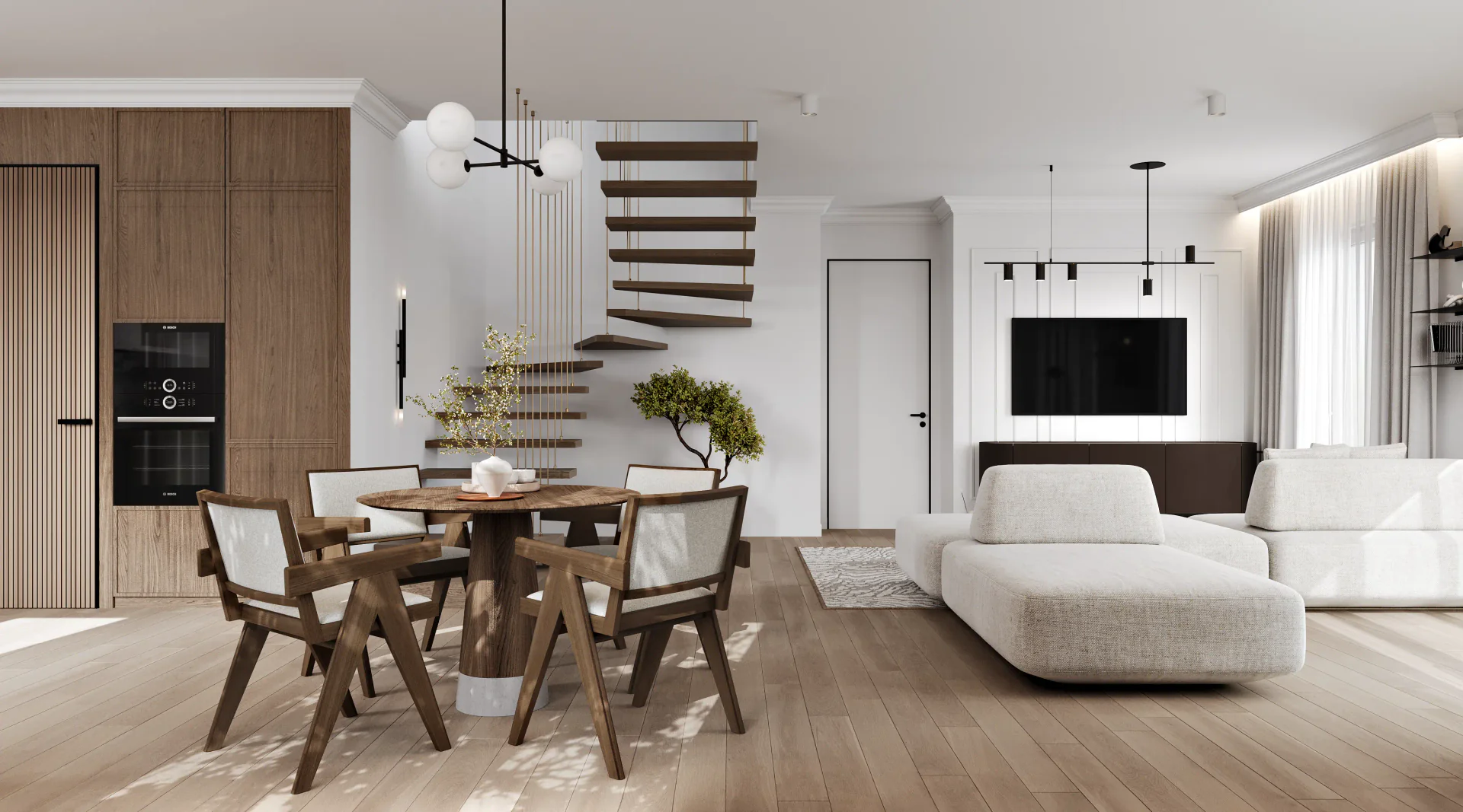 Wide view of an open-plan living space, showing the lounge, TV zone, dining set, kitchen, and staircase.