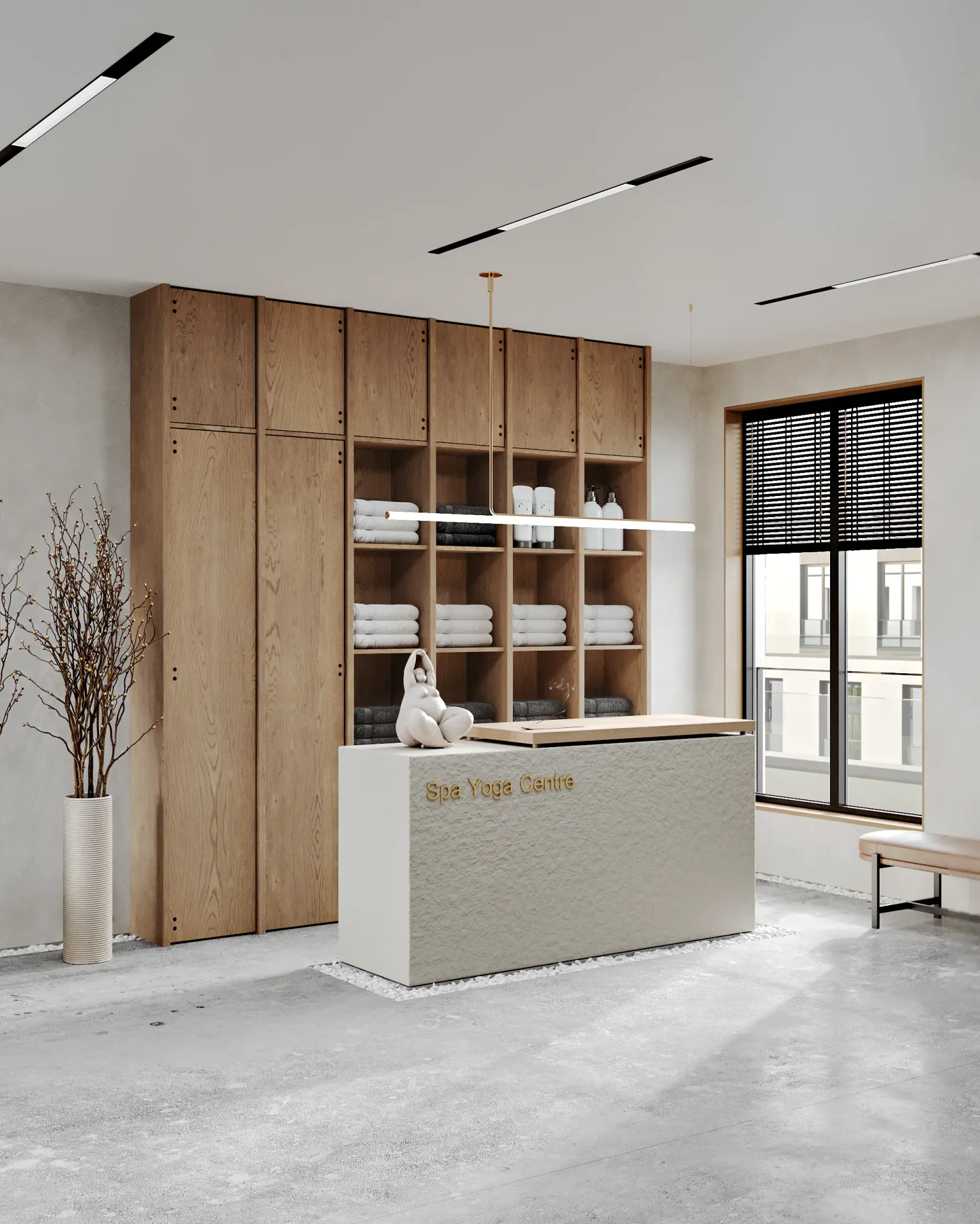 Clean, modern wellness center reception desk with a neatly stocked towel shelf.