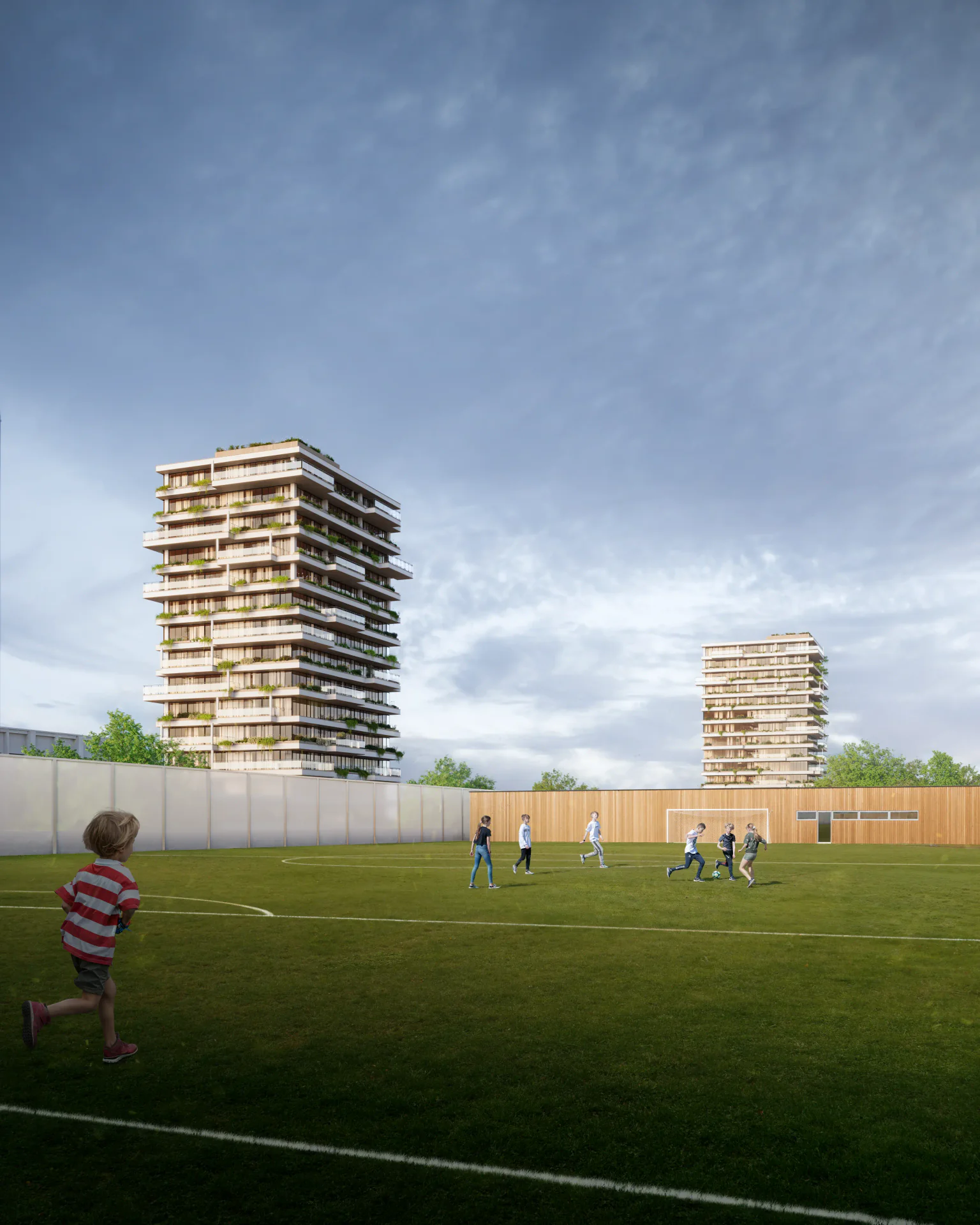 Children playing football on a modern community sports court within the residential complex.