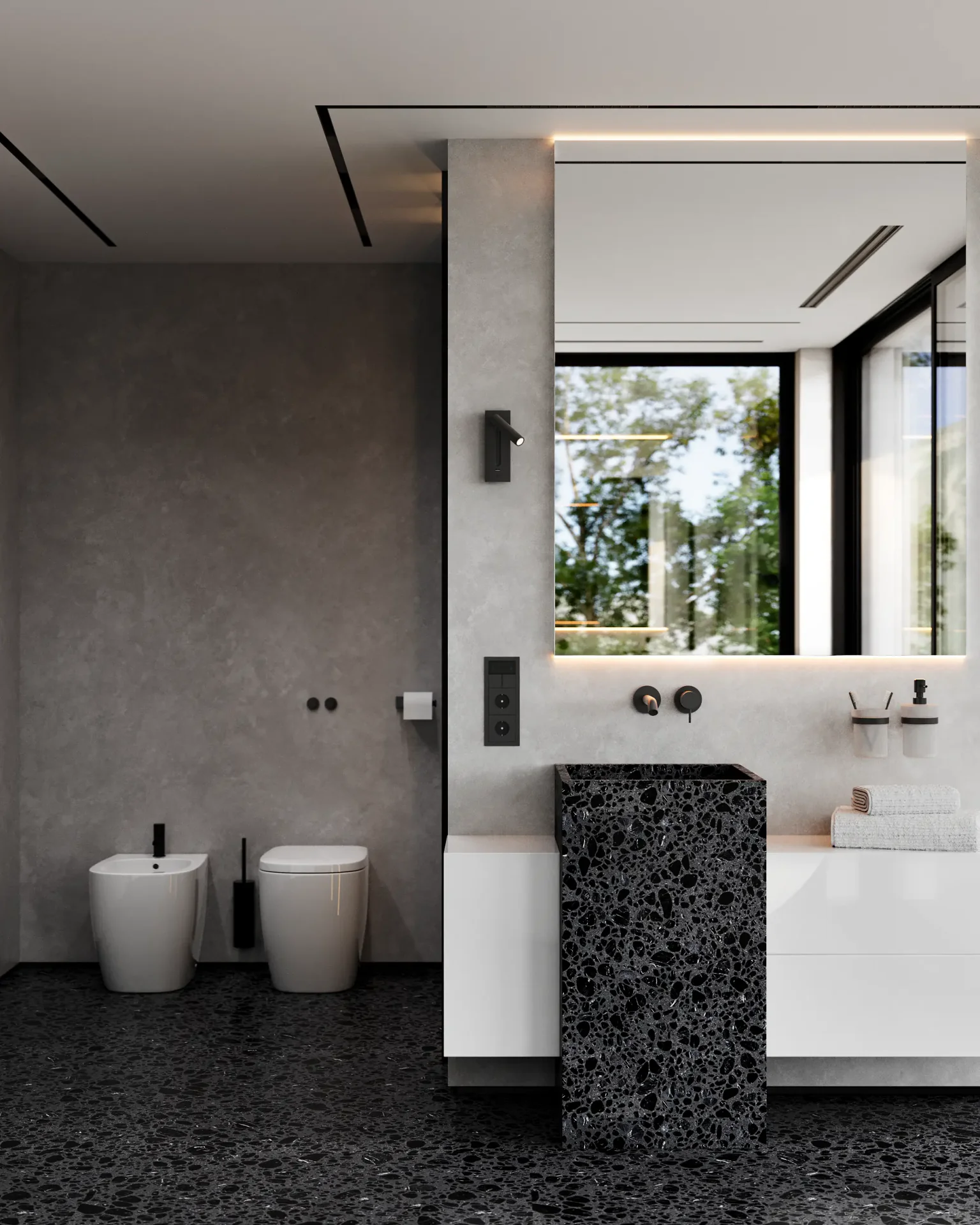 Minimalist bathroom with a wall-mounted toilet and bidet, and a modern sink vanity.
