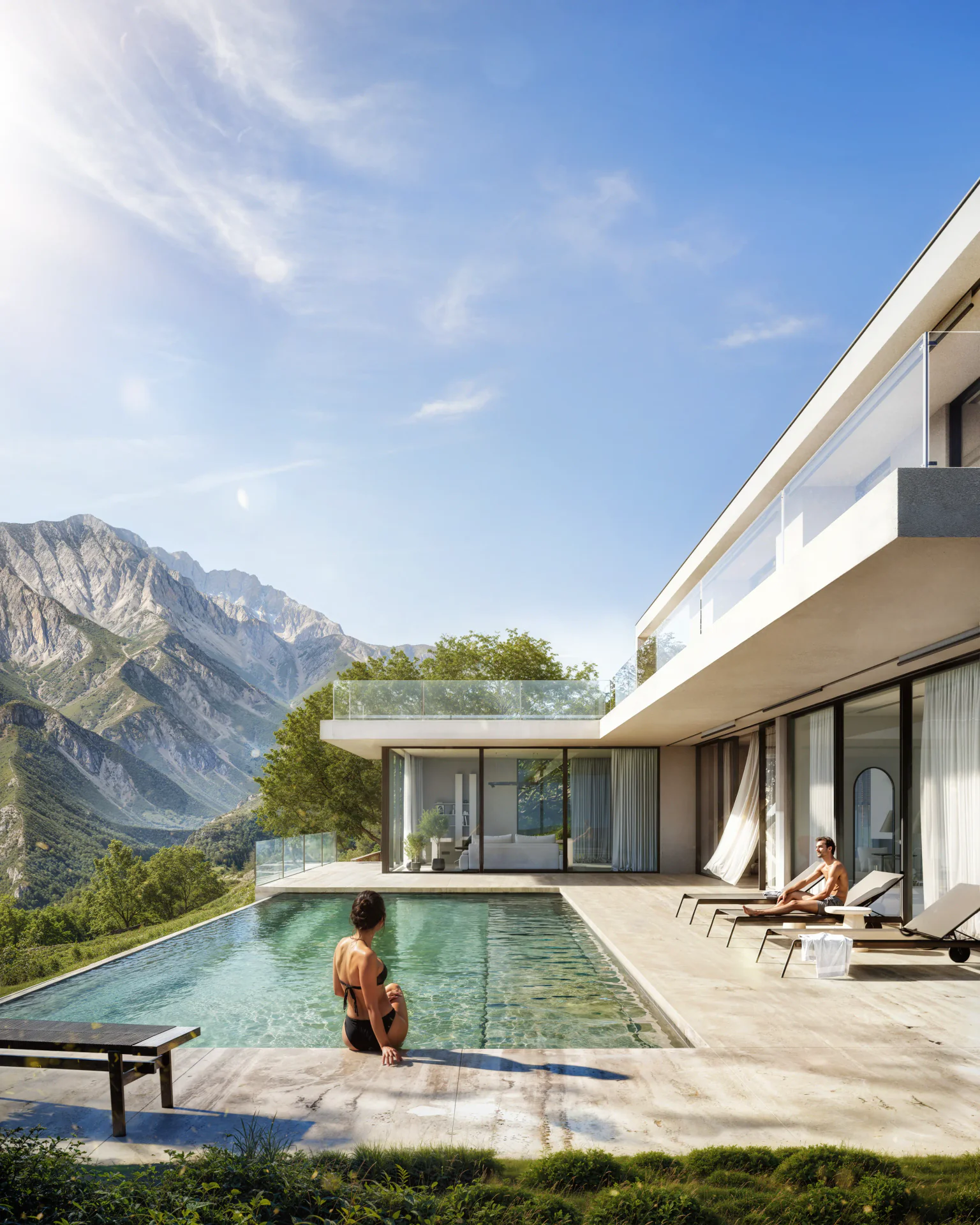 People relaxing by the sparkling swimming pool of a luxurious modern villa.