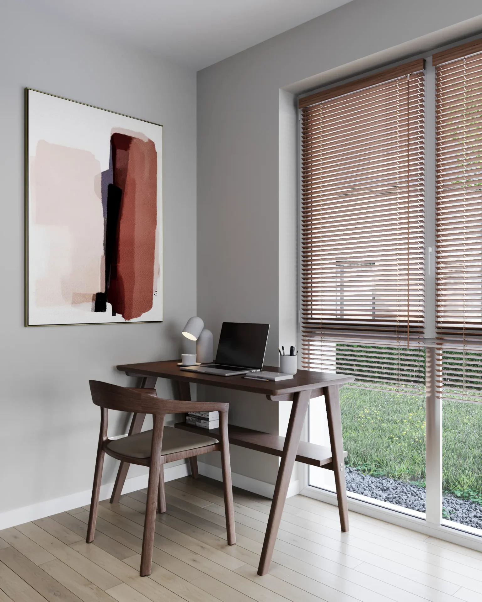 Angled view of a workspace by the window with a desk and painting.