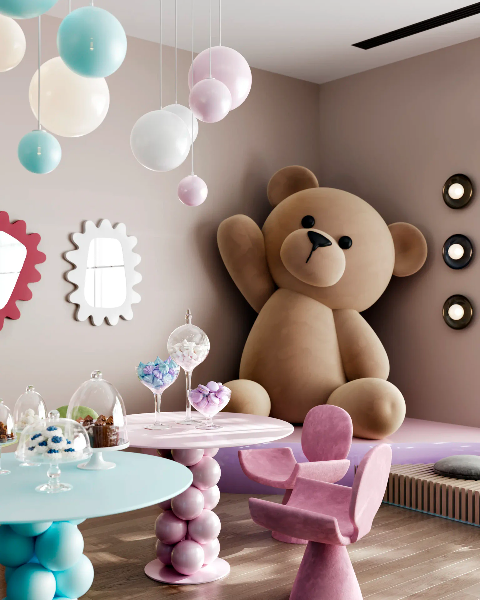Children's party room showing colorful tables set with sweets, cakes, and toys for a celebration.