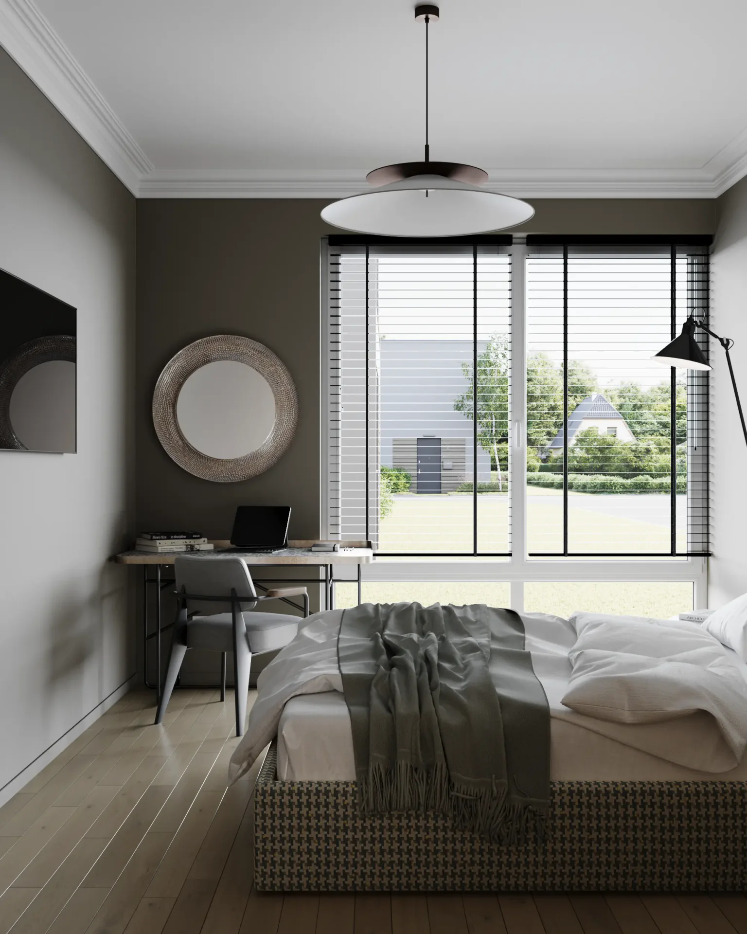 View of a bedroom window, workspace, and part of the bed.