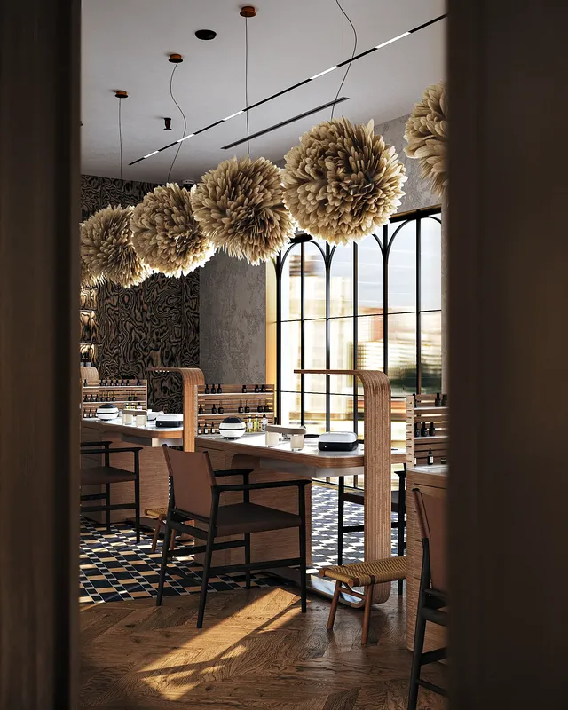 Blick vom Hauptsalon in den speziellen Maniküreraum durch ein großes Innenfenster.