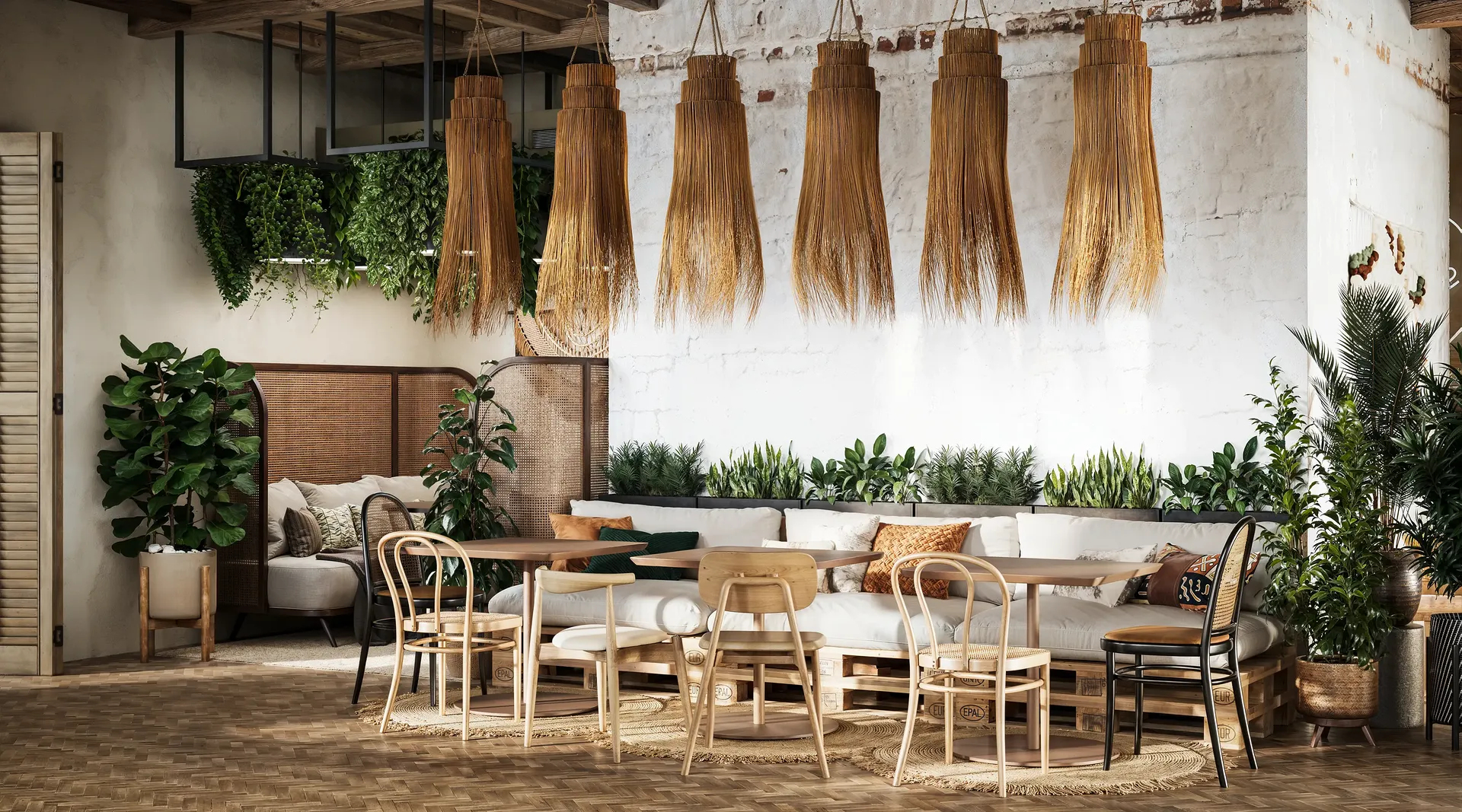 Salle à manger principale avec sièges modulables, comprenant des tables pour deux et des coins banquettes intimes.