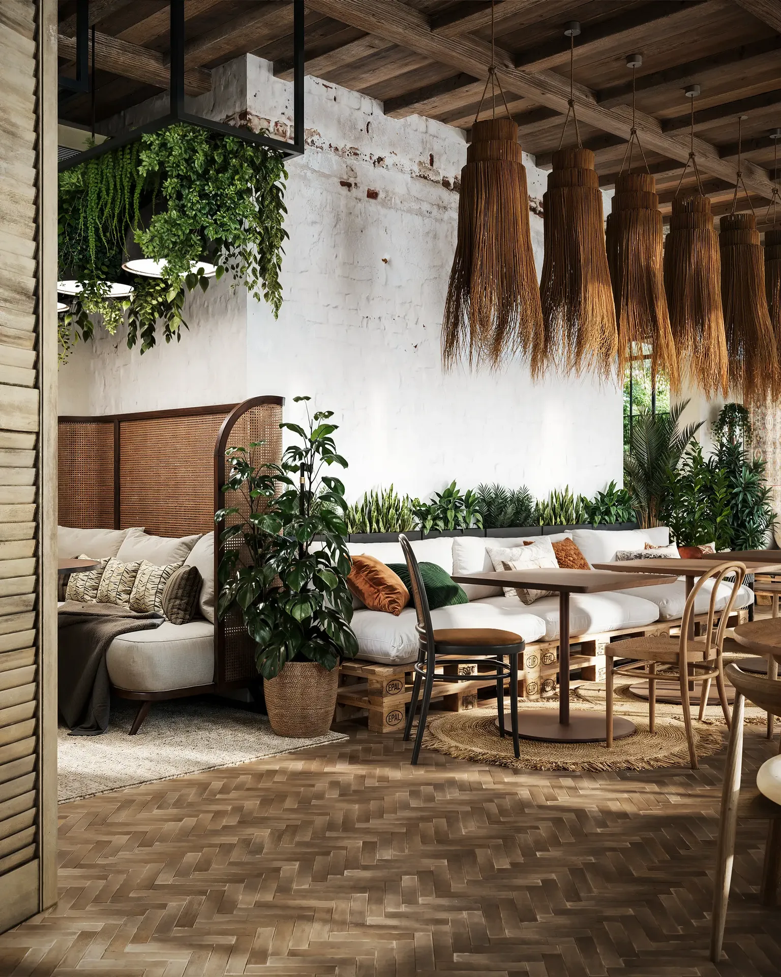 Eckansicht des Hauptspeisesaals mit verschiedenen Sitzgruppen mit Nischen und kleinen Tischen.