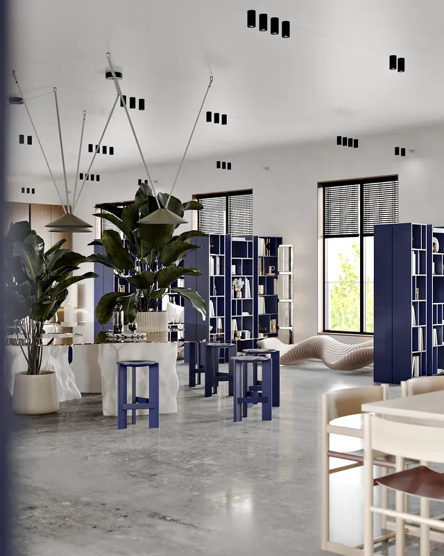 Vue large d'une bibliothèque moderne montrant des tables d'étude individuelles et de vastes étagères.