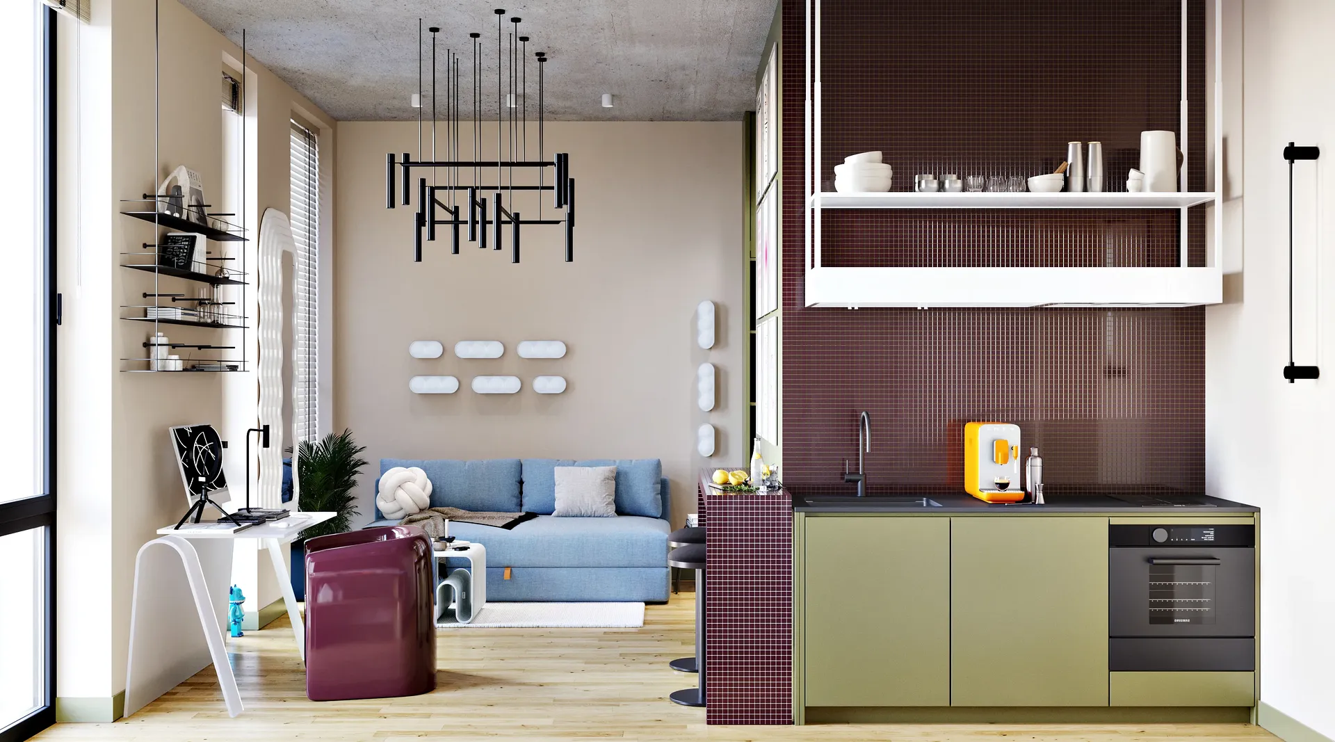 Aménagement studio décloisonné montrant cuisine, salon et bureau