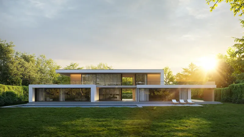 Vorderansicht einer Luxusvilla, getaucht in sanftes Sonnenaufgangslicht