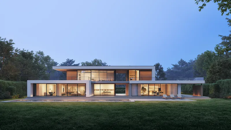 Vue extérieure de la façade de la villa lors d'une soirée chaleureuse et confortable