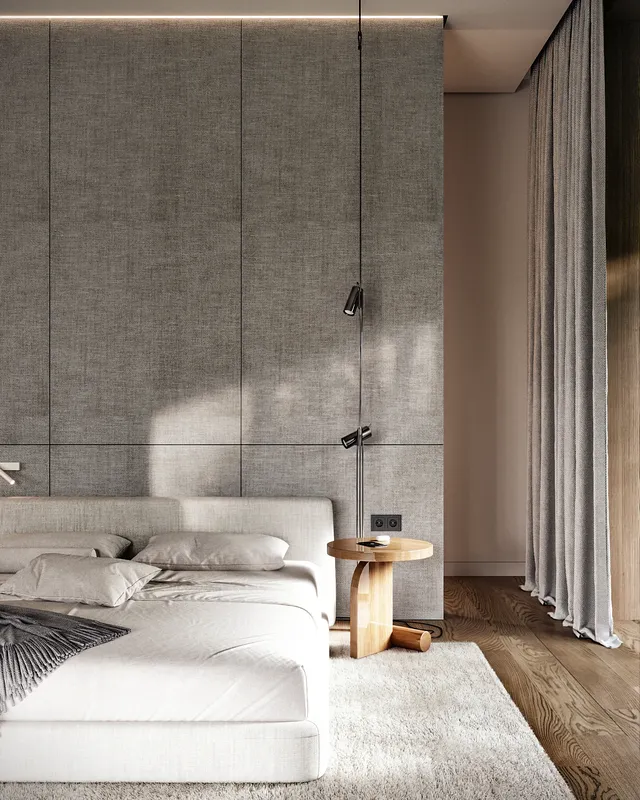 Vue de face d'une chambre comprenant un lit, une table de chevet et une cloison de penderie.